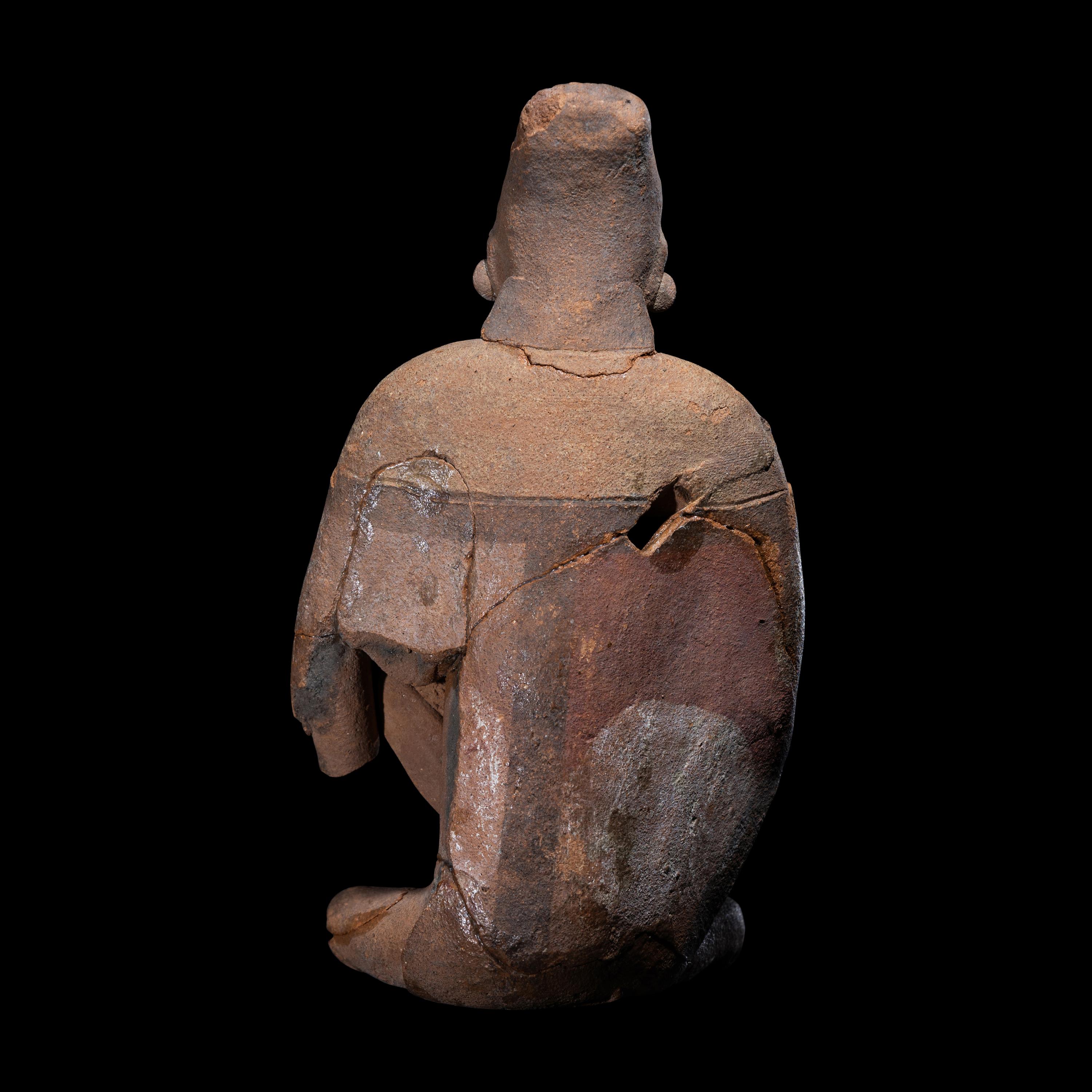 An Attic Red-Figured Squat Lekythos