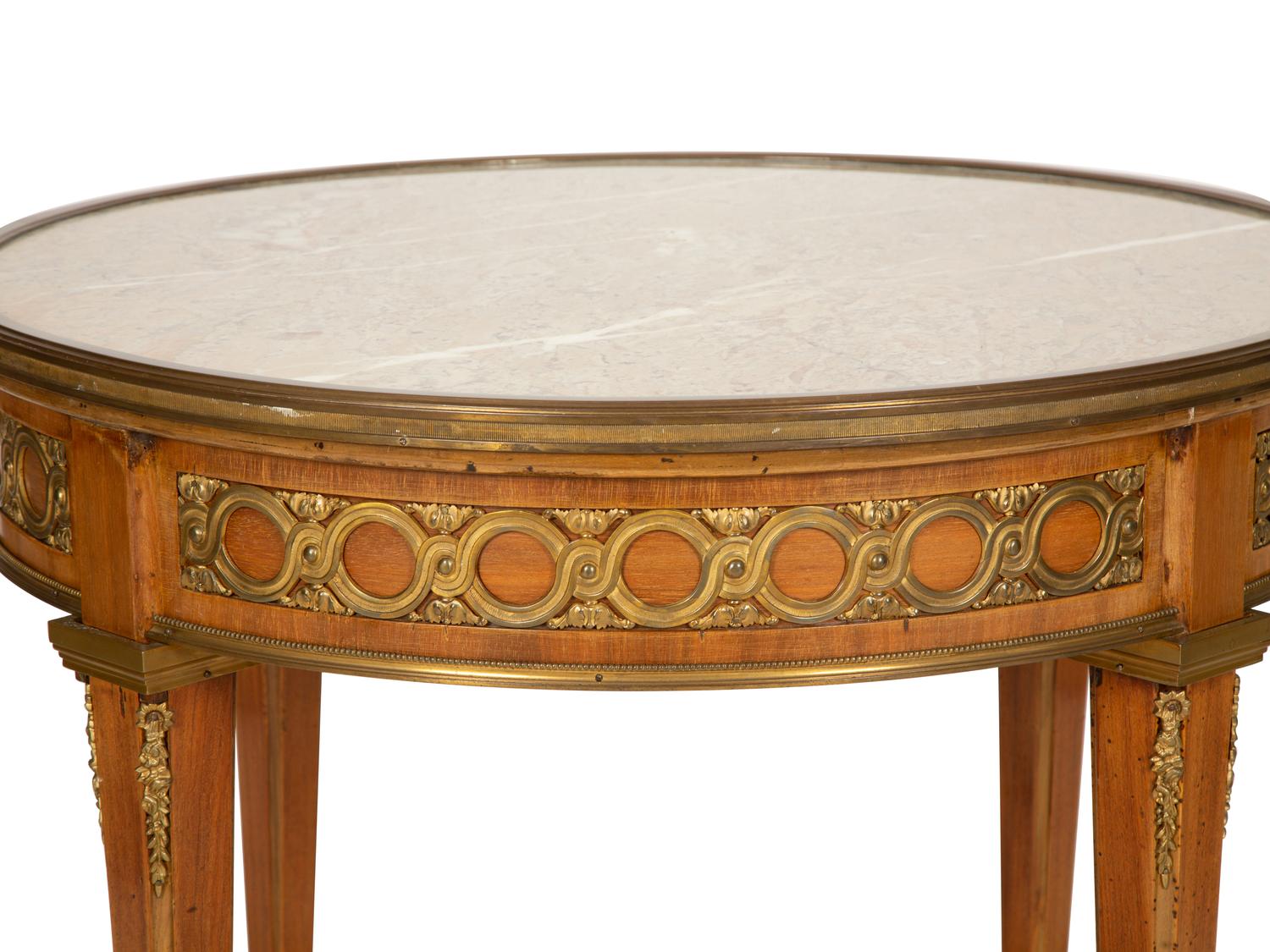 A Louis XVI Style Gilt Bronze Mounted Mahogany Marble-Top Guéridon
