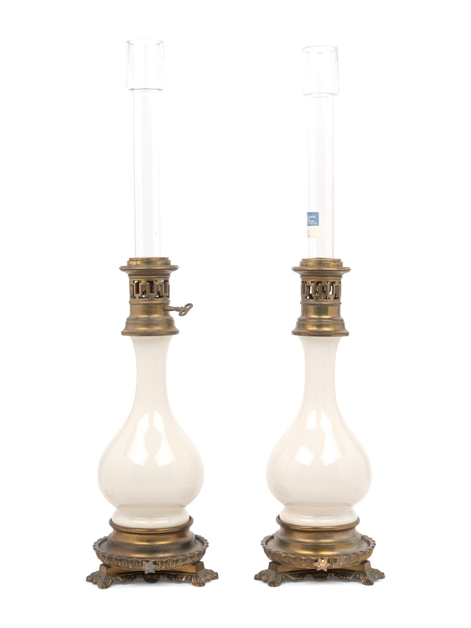 A Pair of French Opaline Glass Fluid Lamps with Etched Glass Shades Converted to Electricity