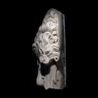 A Roman Marble Support in the form of the Nemean Lion Skin and Club of Hercules