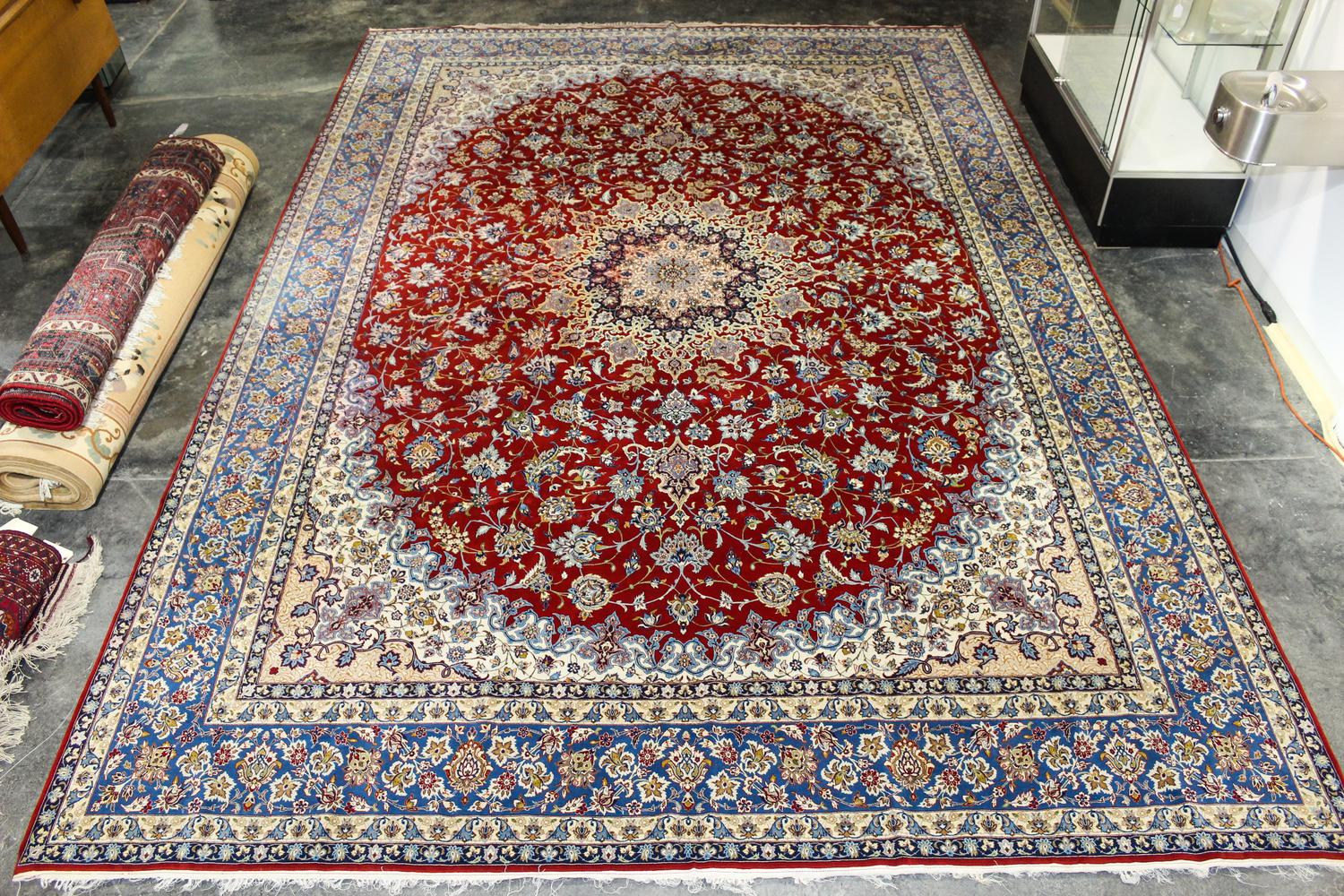 A Tabriz Wool and Silk Rug 14 feet 4 inches x 10 feet.