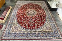 A Tabriz Wool and Silk Rug 14 feet 4 inches x 10 feet.