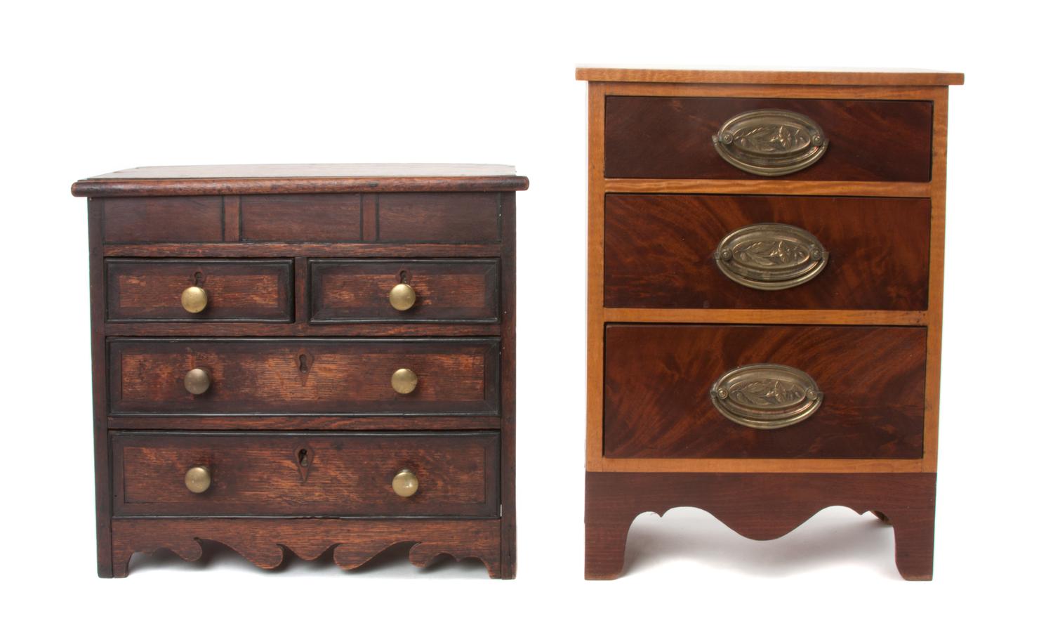 Two Miniature Chests of Drawers Height of first: 16 inches.