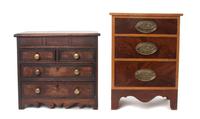 Two Miniature Chests of Drawers Height of first: 16 inches.