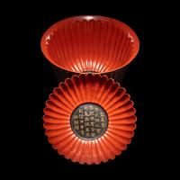 A Fine Red Lacquer Inscribed 'Chrysanthemum' Tea Bowl and Cover, Qianlong Mark 乾隆年製款 朱漆御題詩菊瓣式蓋碗