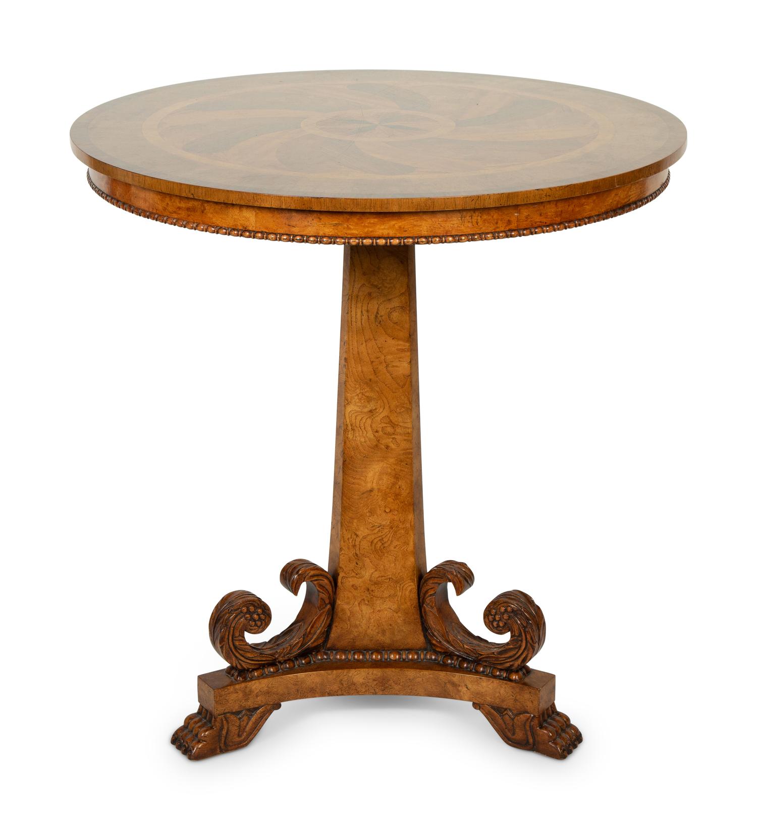 A Baker Regency Style Mahogany, Walnut and Elmwood Center Table