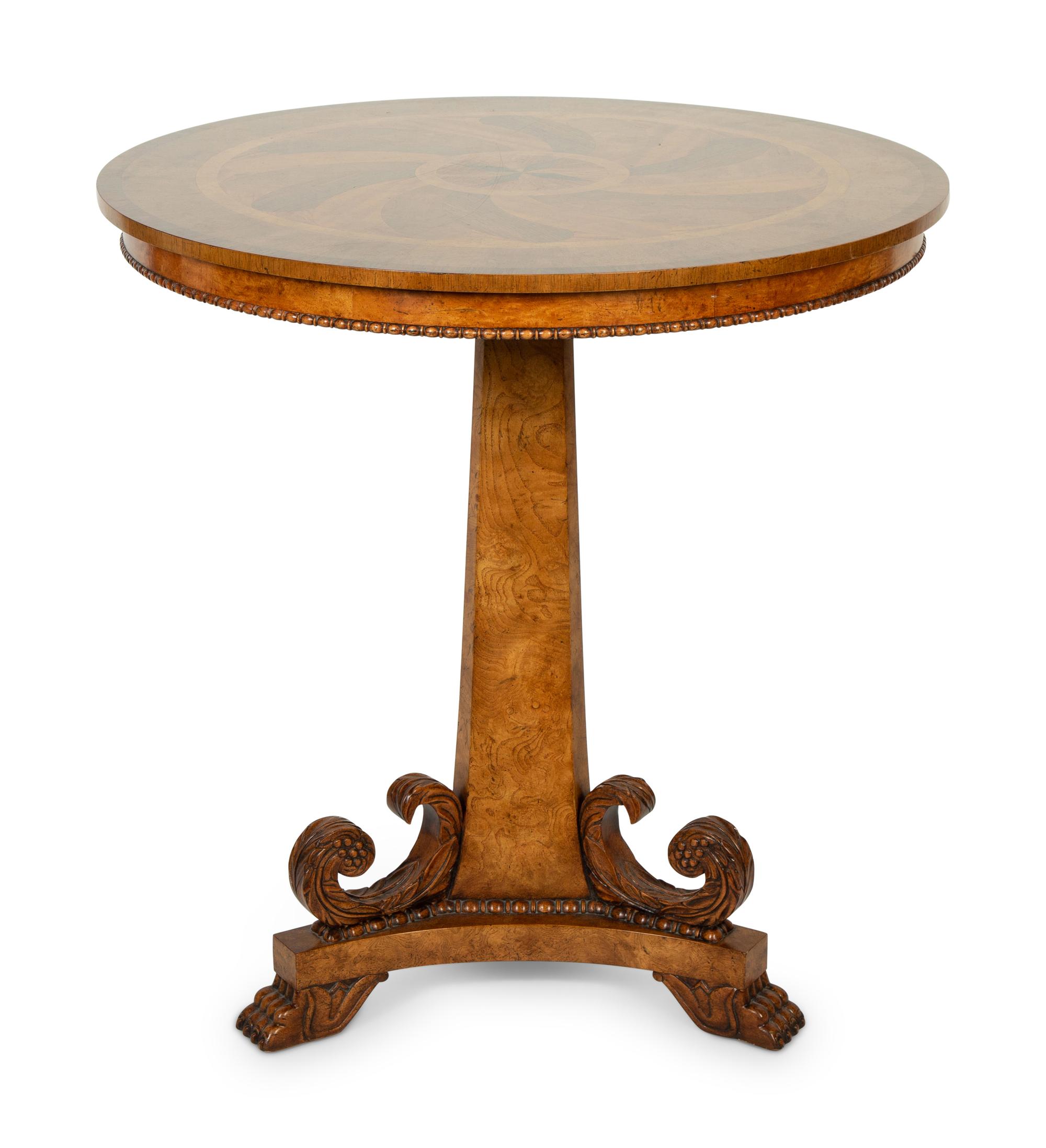 A Baker Regency Style Mahogany, Walnut and Elmwood Center Table