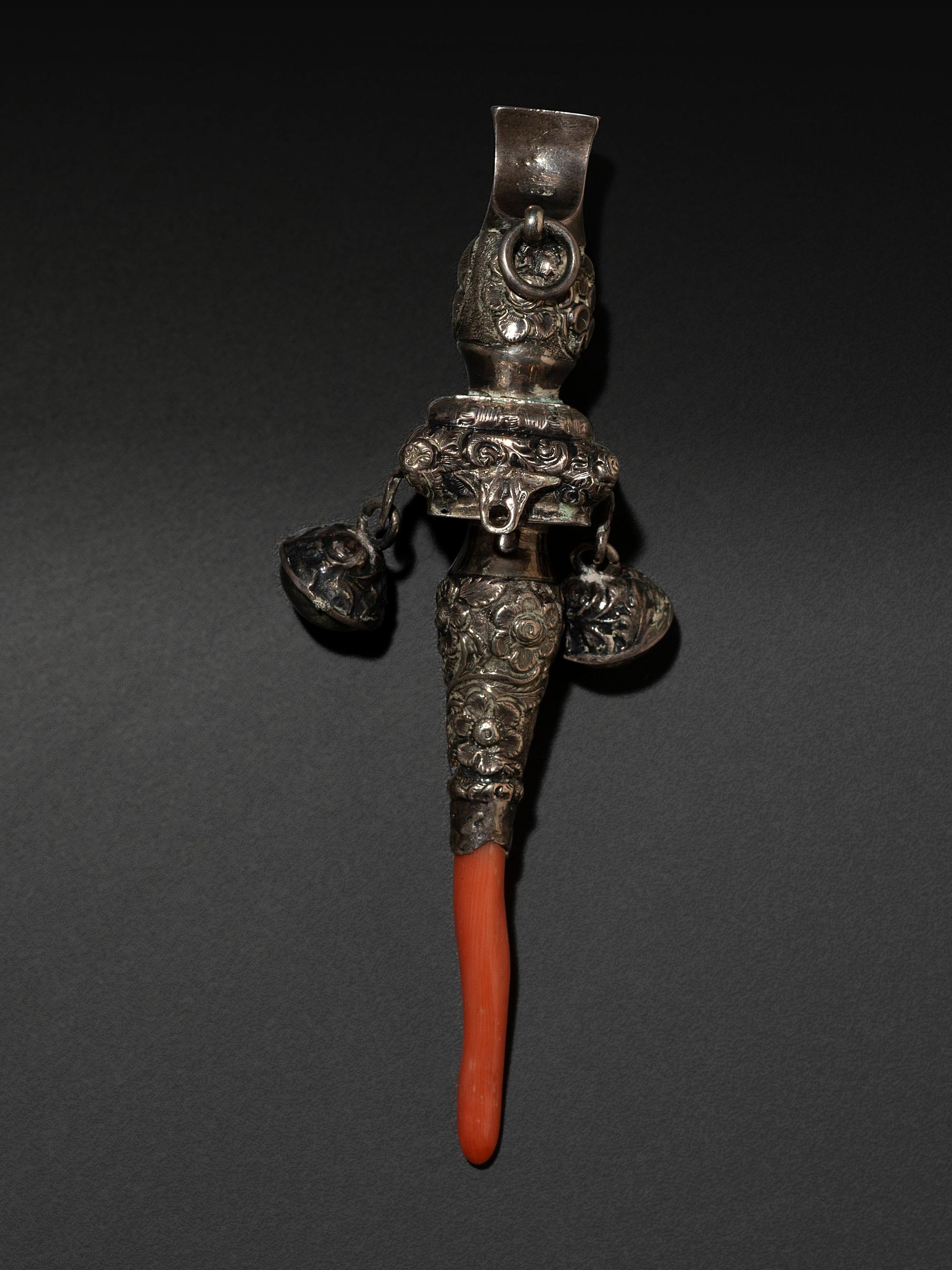 A Silver and Coral Mounted Child's Rattle Whistle
