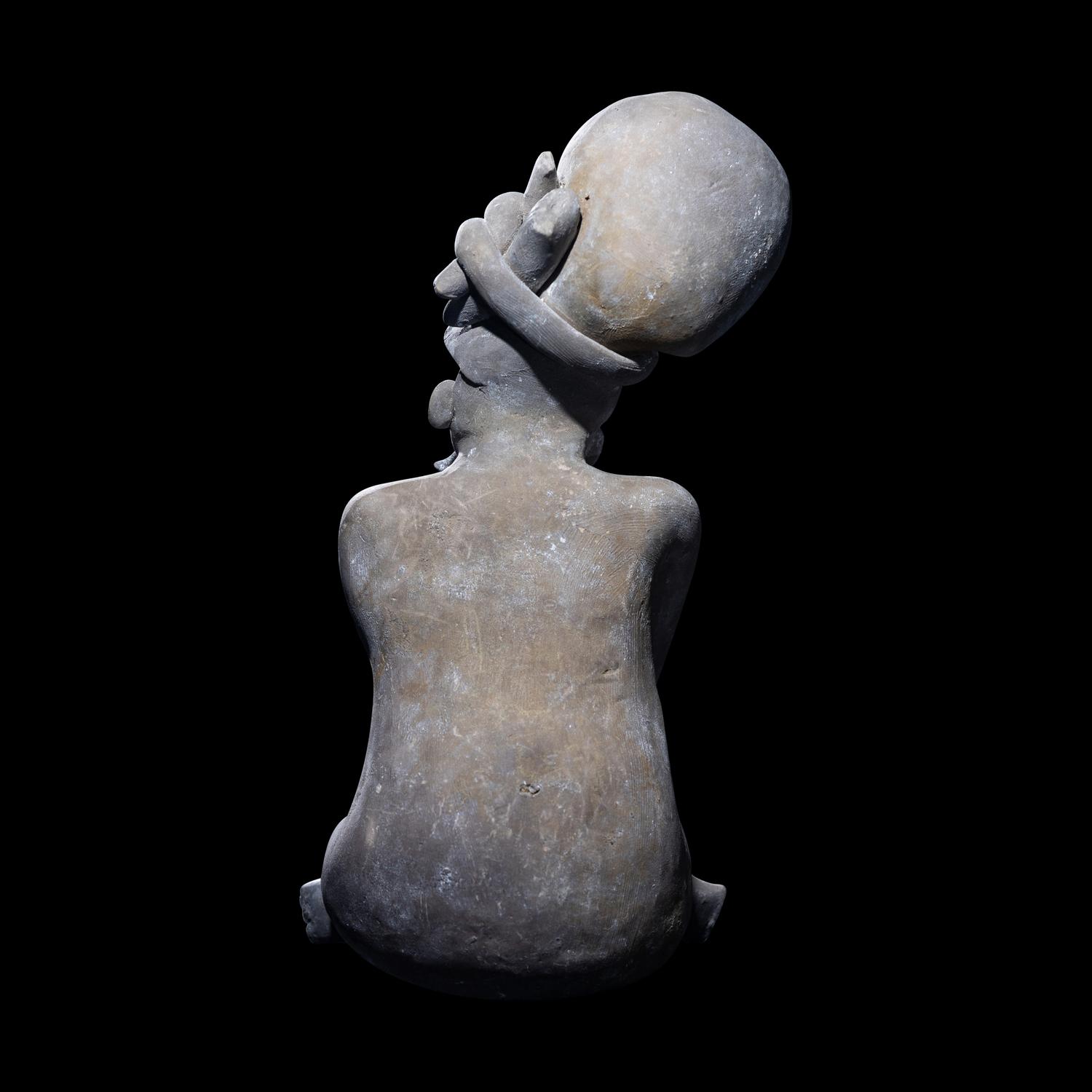 A Maya Seated Scribe