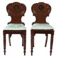 A Pair of Regency Mahogany Hall Chairs Height 33 inches. — 19TH CENTURY