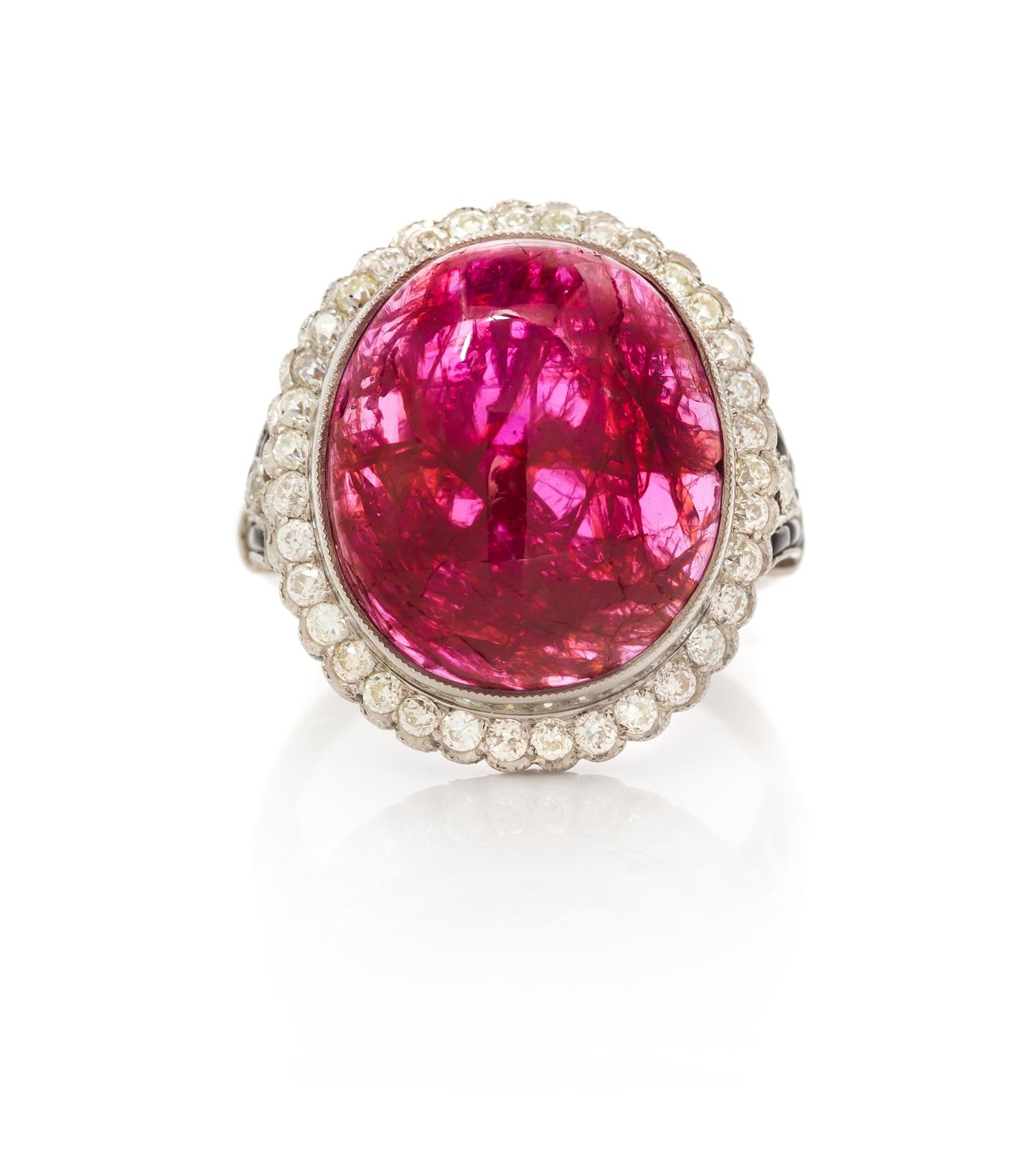 An Art Deco Platinum, Ruby, Diamond and Onyx Ring, 5.00 dwts.