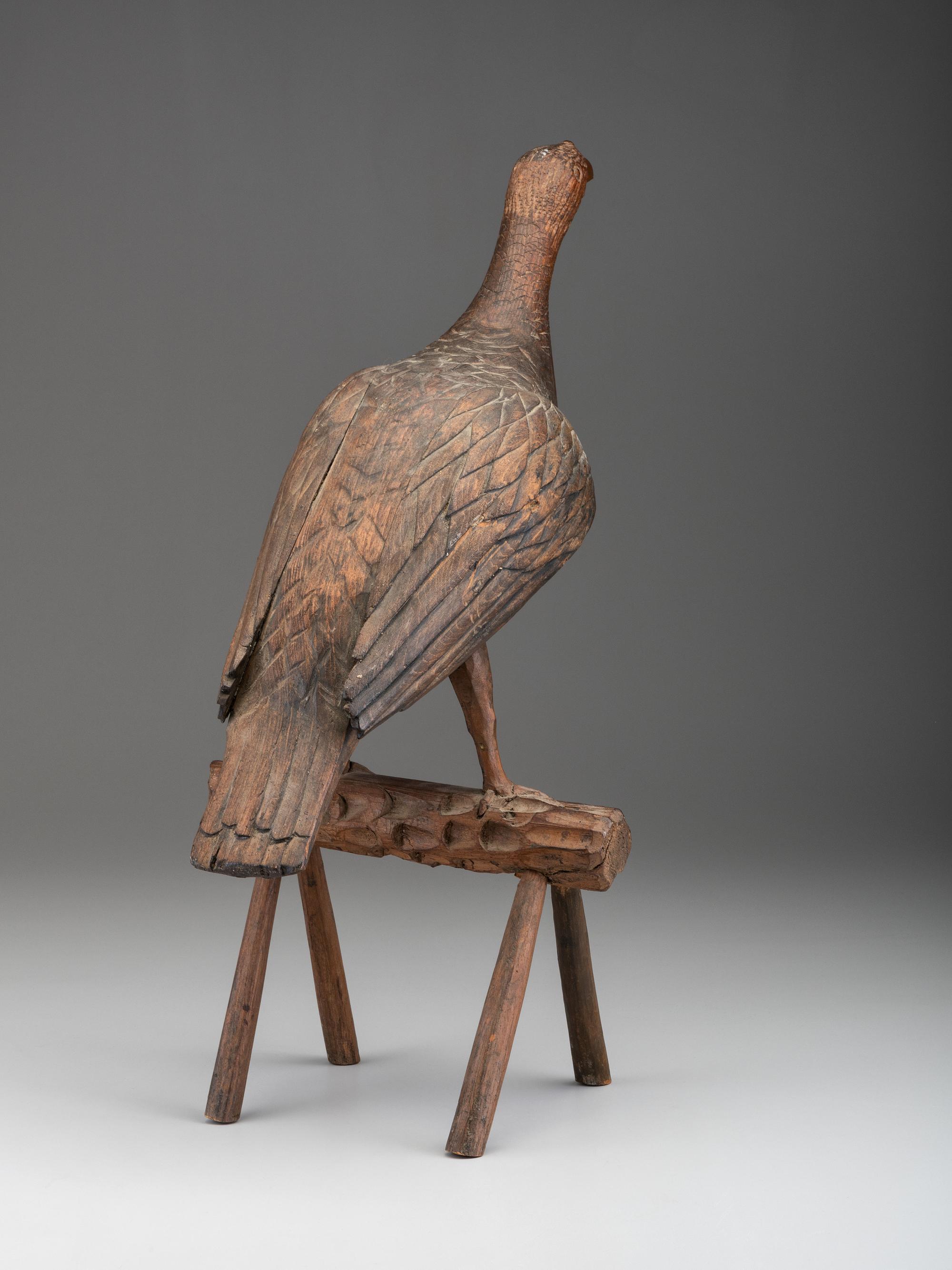 A Folk Art Carved Wood Turkey