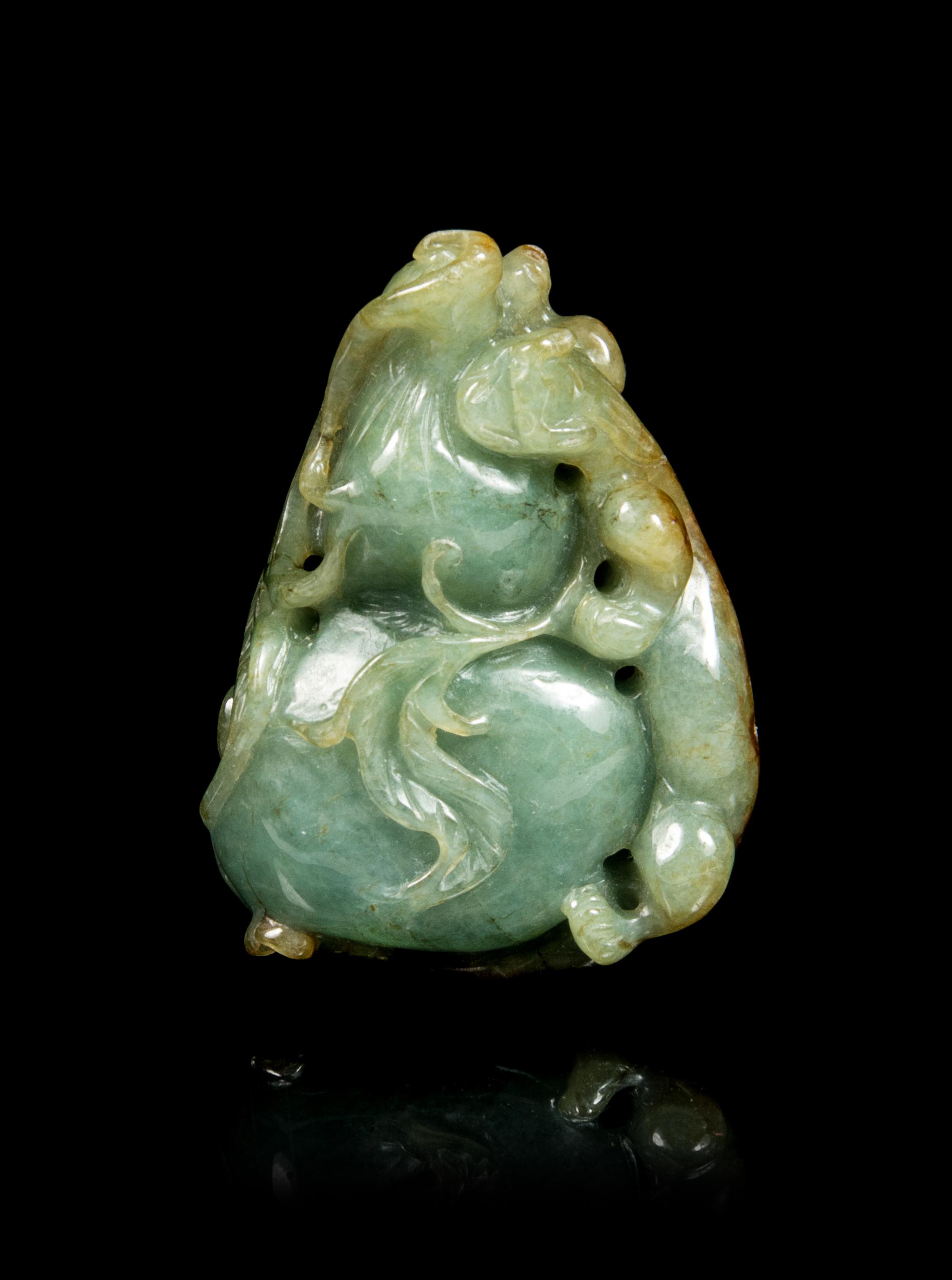 A Chinese Jade Pendant of a Gourd Length 1 7/8 inches. — 20TH CENTURY