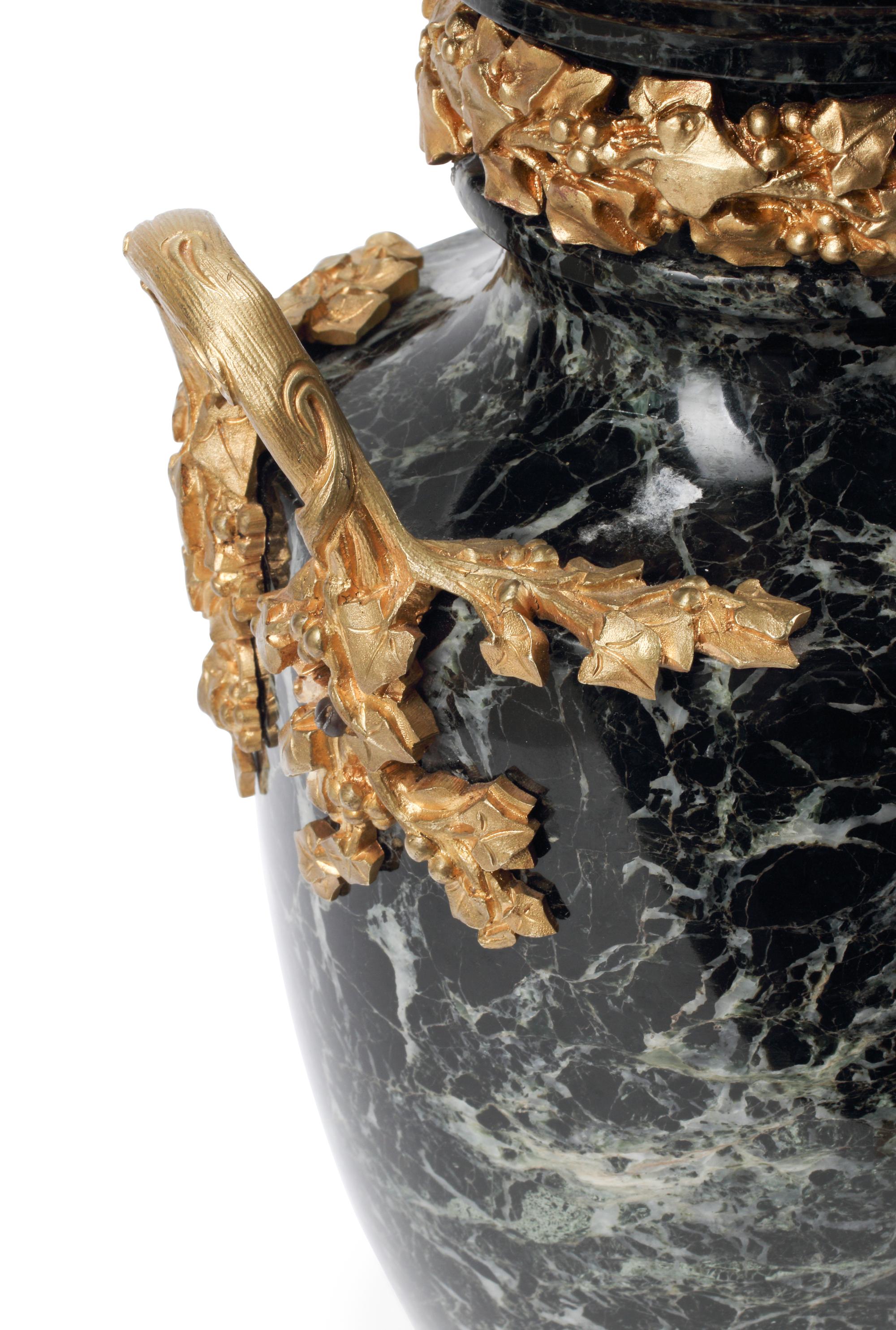 A Pair of Louis XV Style Gilt Bronze Mounted Marble Urns
