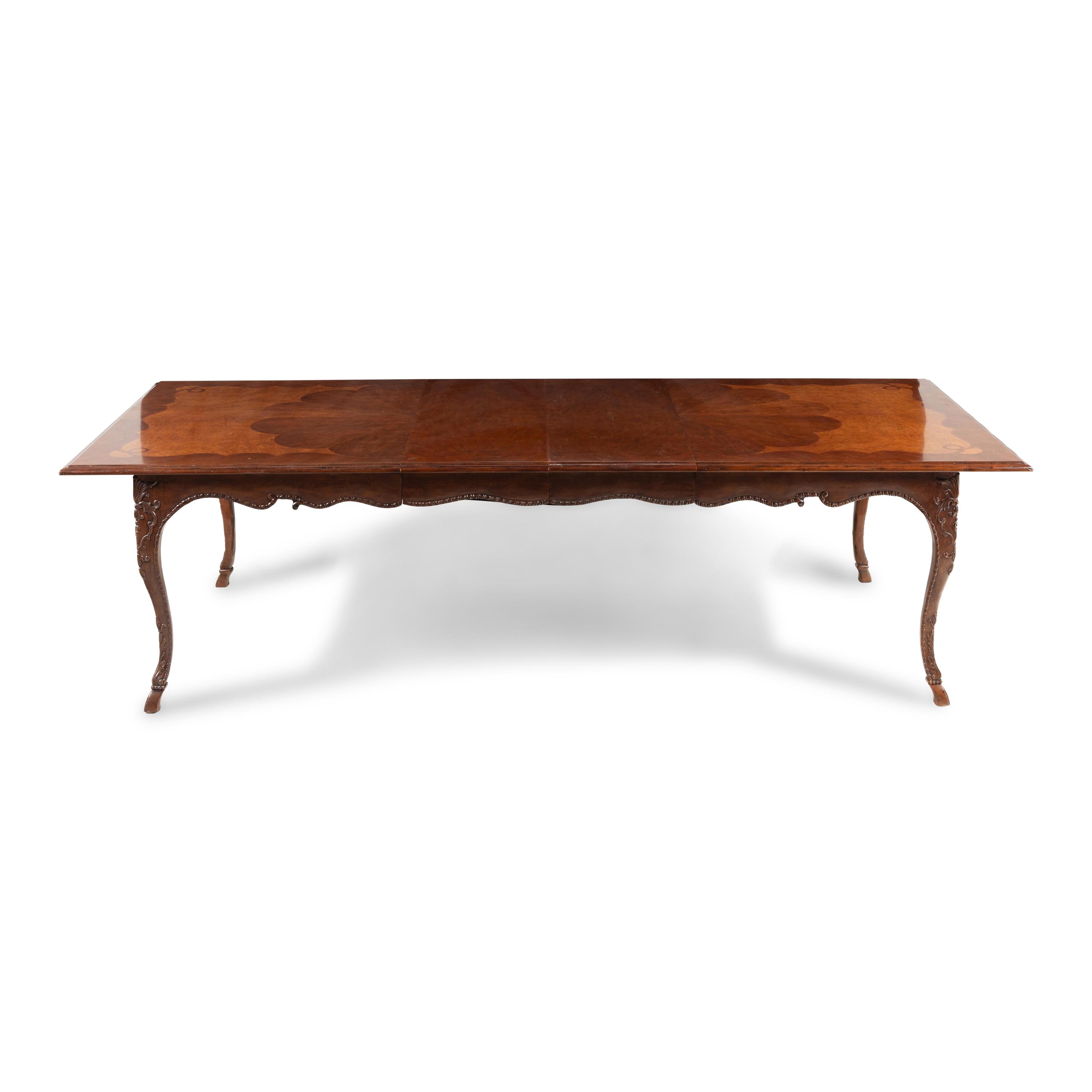 A Baker Mahogany and Burl Walnut Dining Table