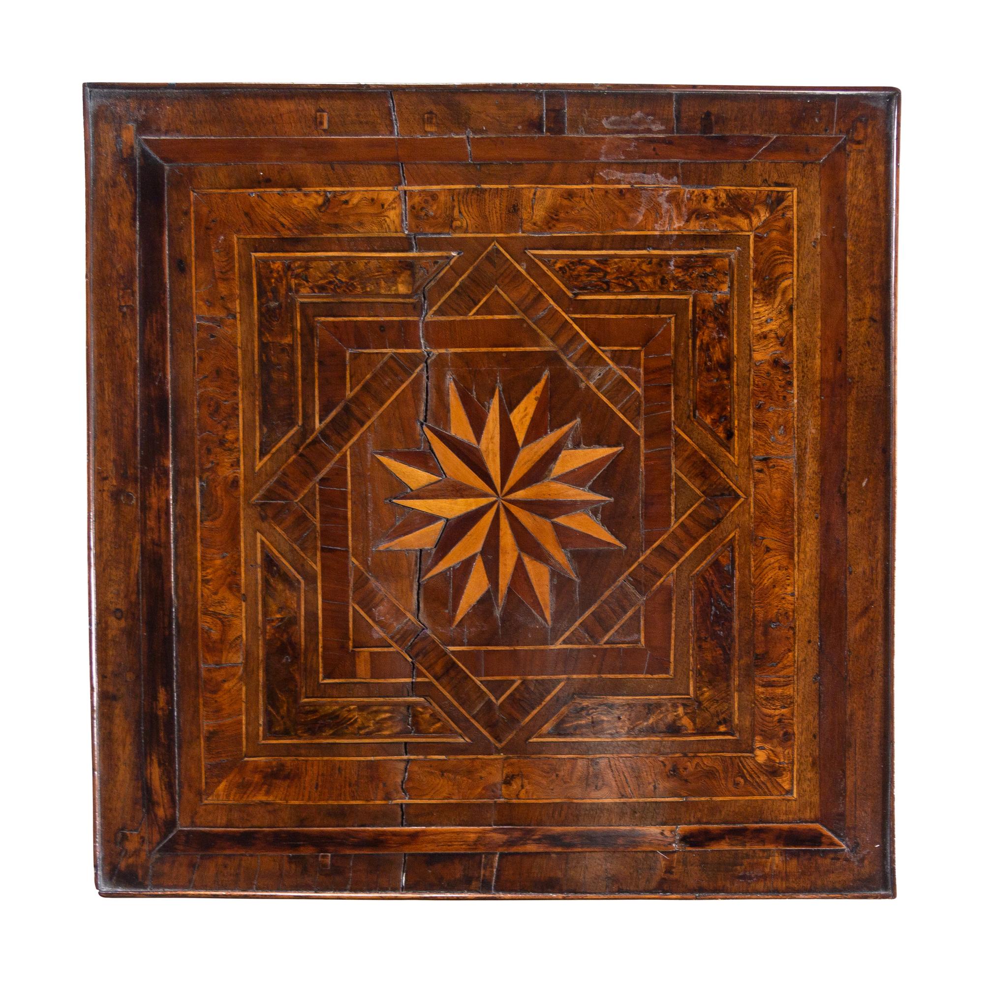 A Louis XVI Burlwood and Parquetry Table
