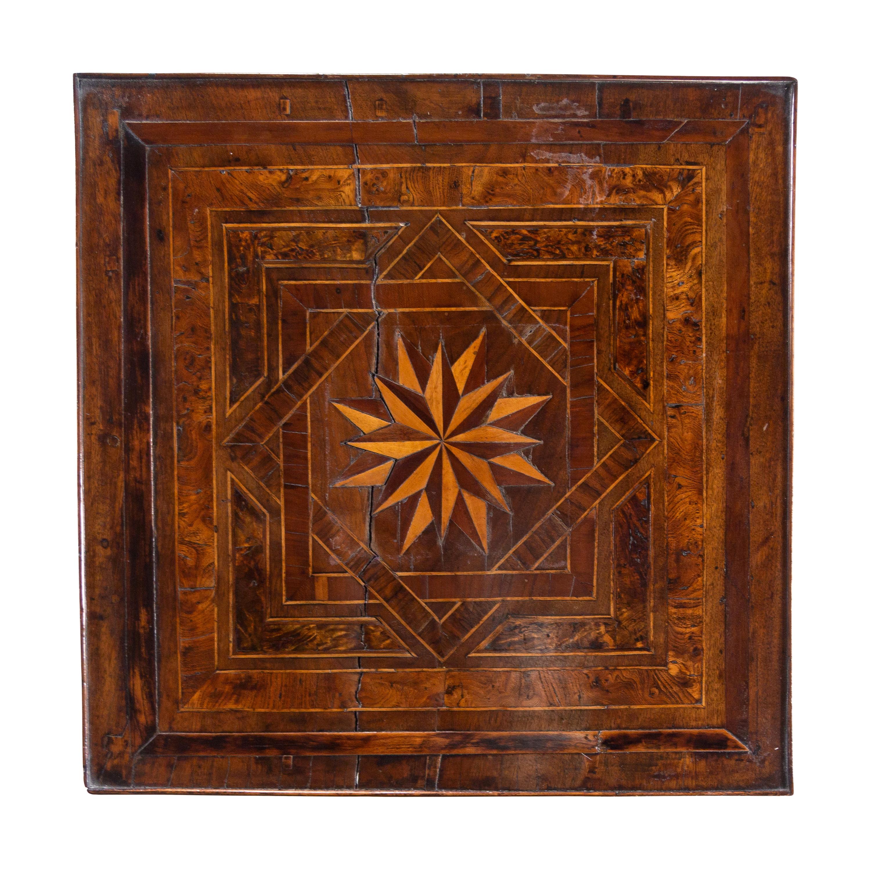 A Louis XVI Burlwood and Parquetry Table