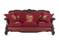 A Rococo Revival Carved Walnut Three-Piece Seating Suite in the Style of Karpen