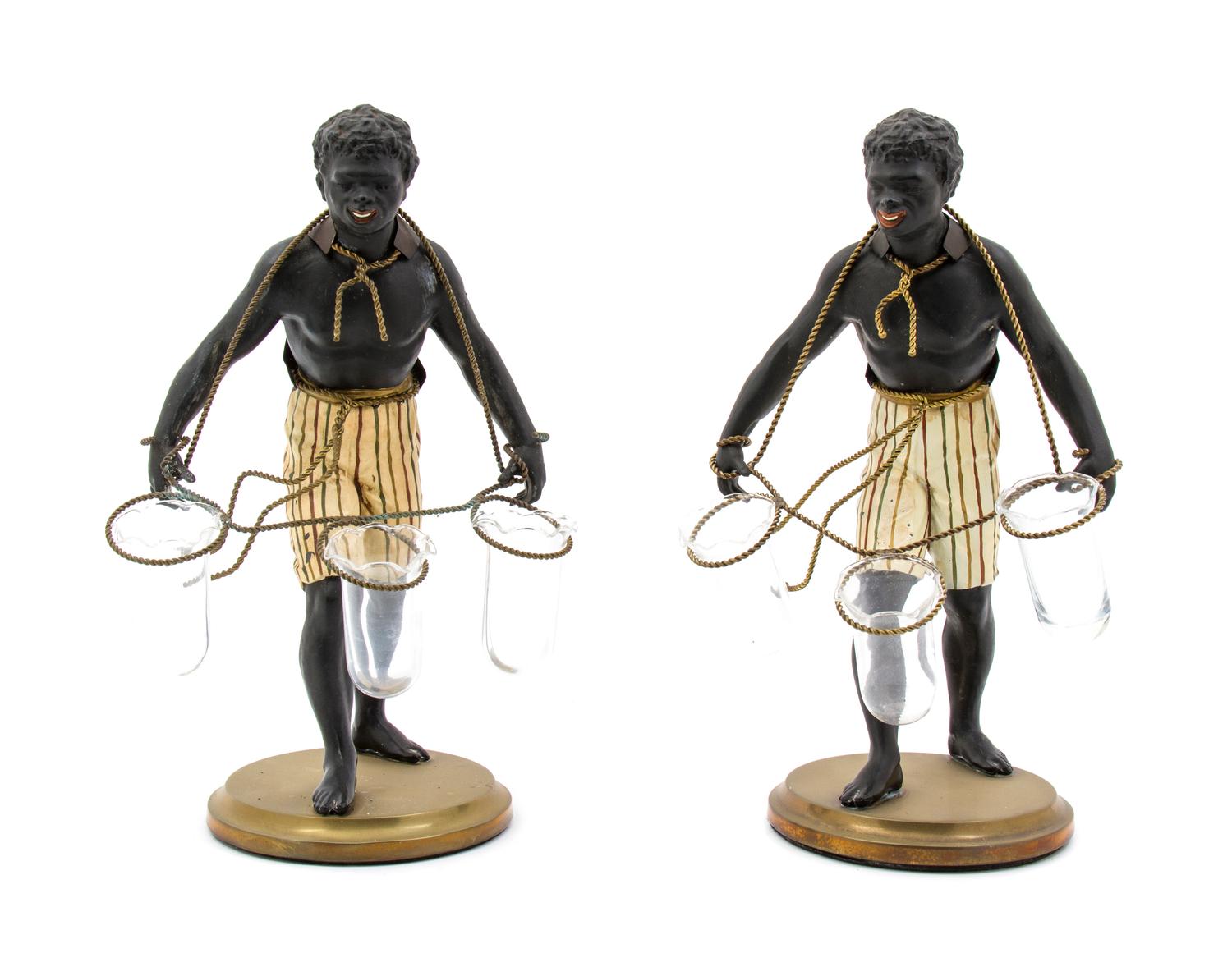 A Pair of Cast Metal Figural Tulipieres, Height 13 inches.
