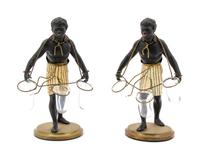 A Pair of Cast Metal Figural Tulipieres, Height 13 inches.