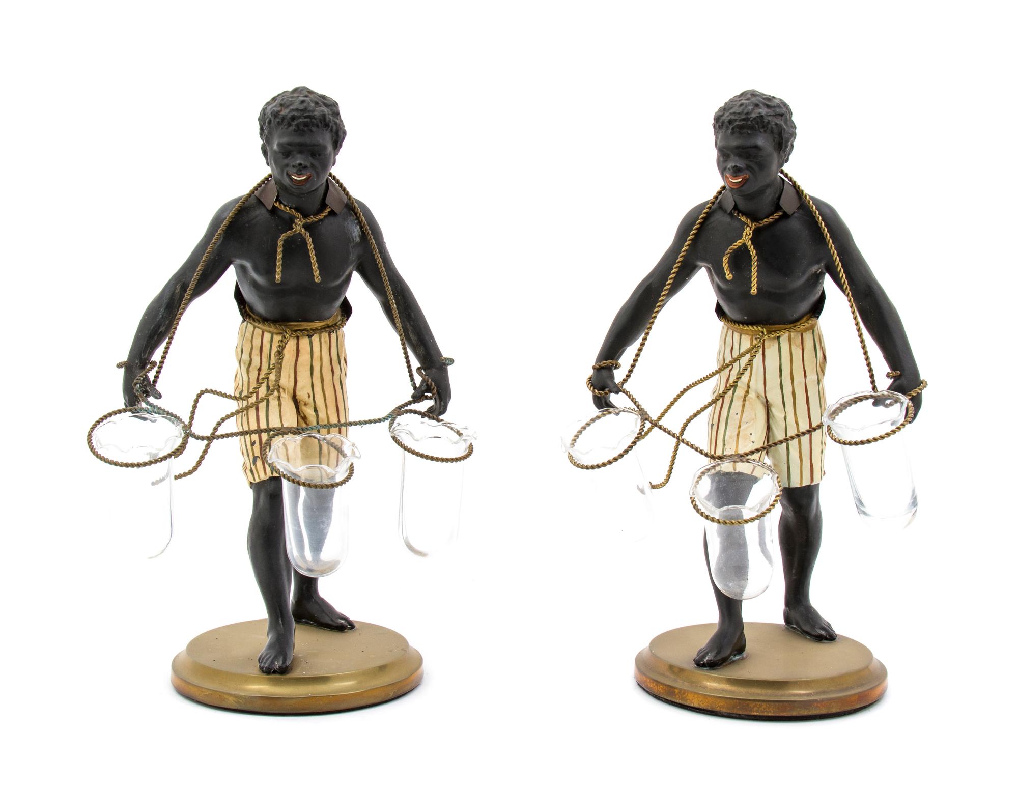 A Pair of Cast Metal Figural Tulipieres, Height 13 inches.
