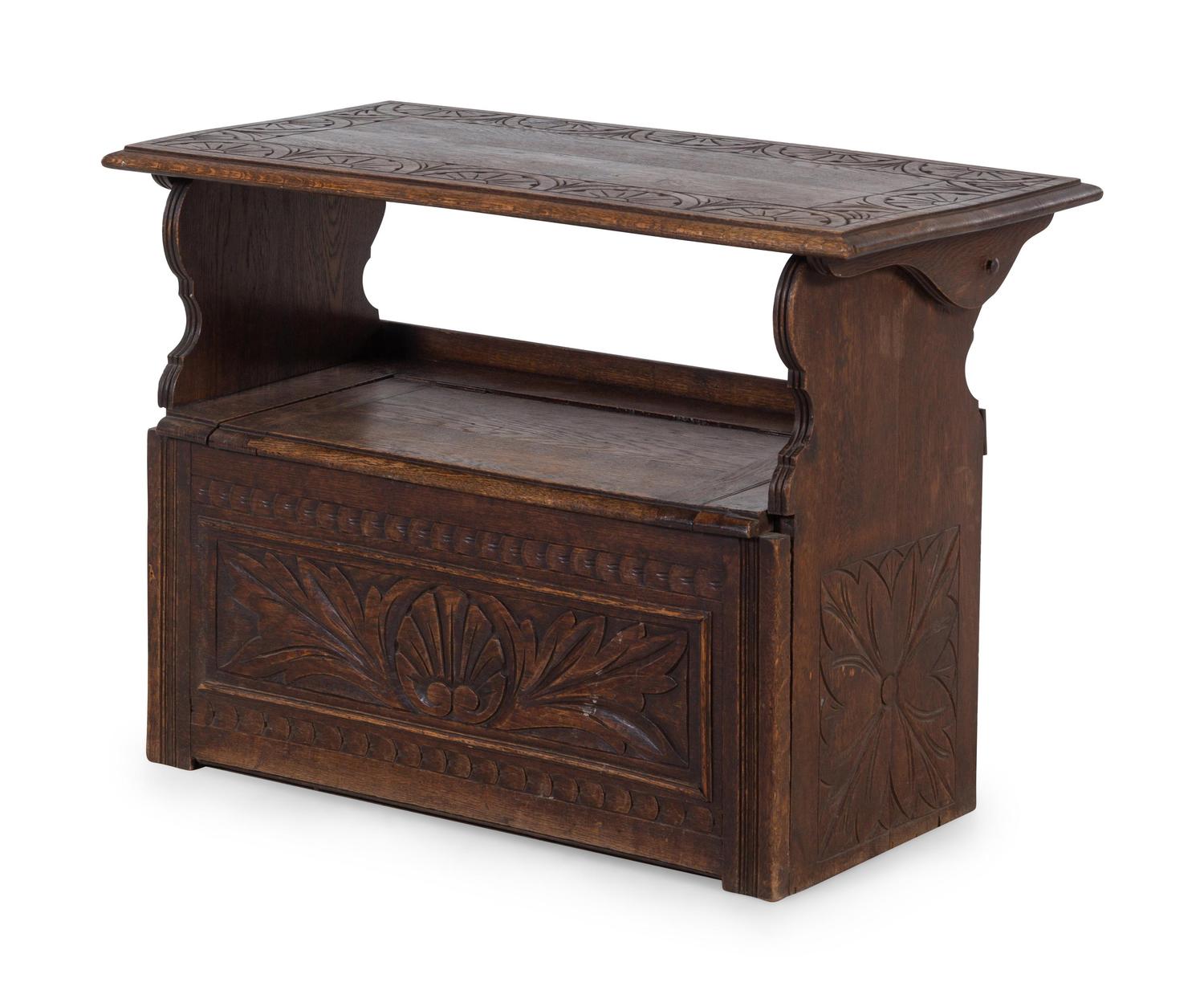 A Jacobean Style Carved Oak Metamorphic Monks Settle