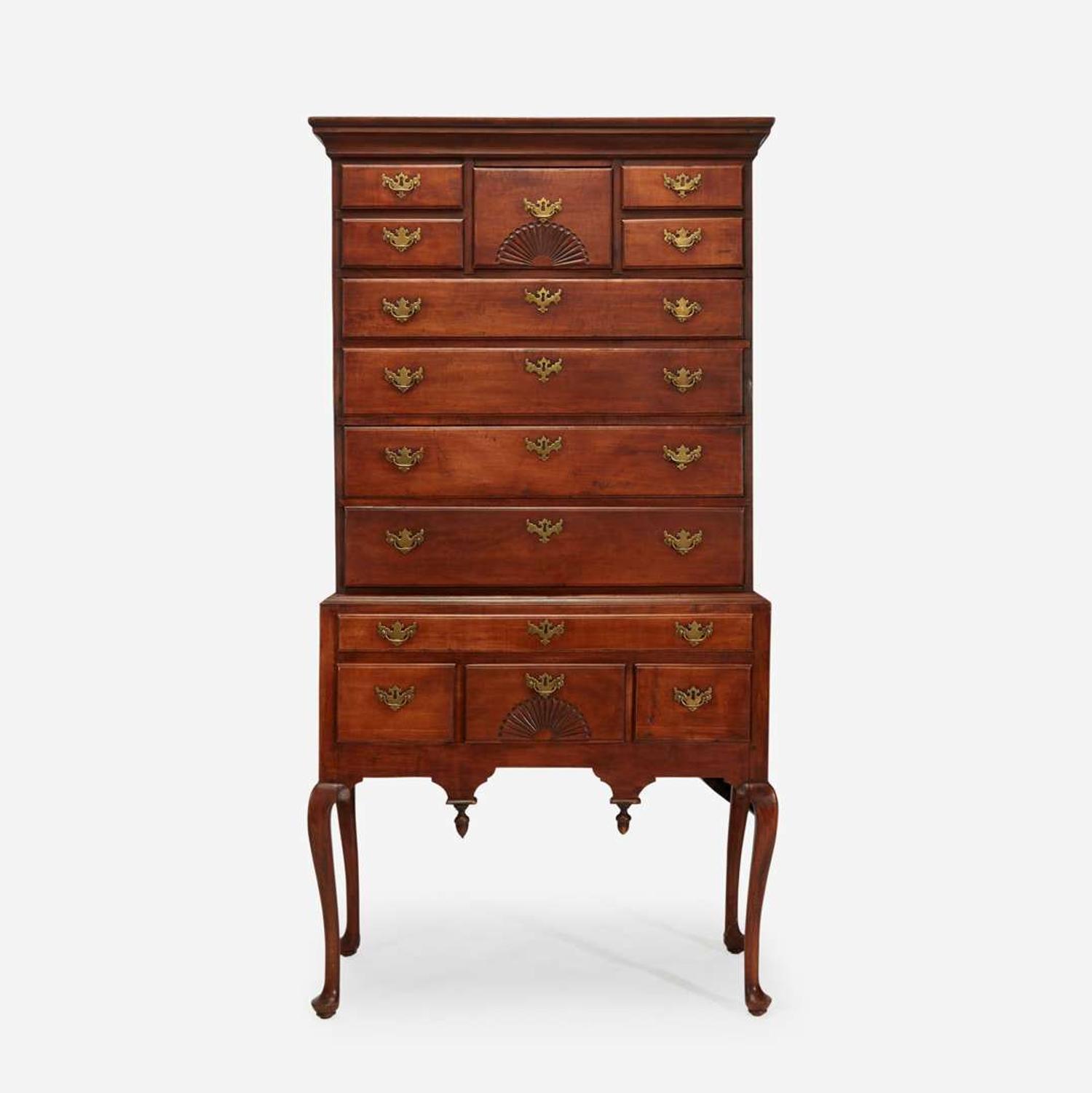 A Queen Anne carved cherry high chest New England, mid-18th century