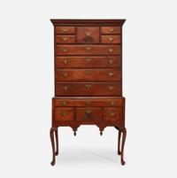 A Queen Anne carved cherry high chest New England, mid-18th century