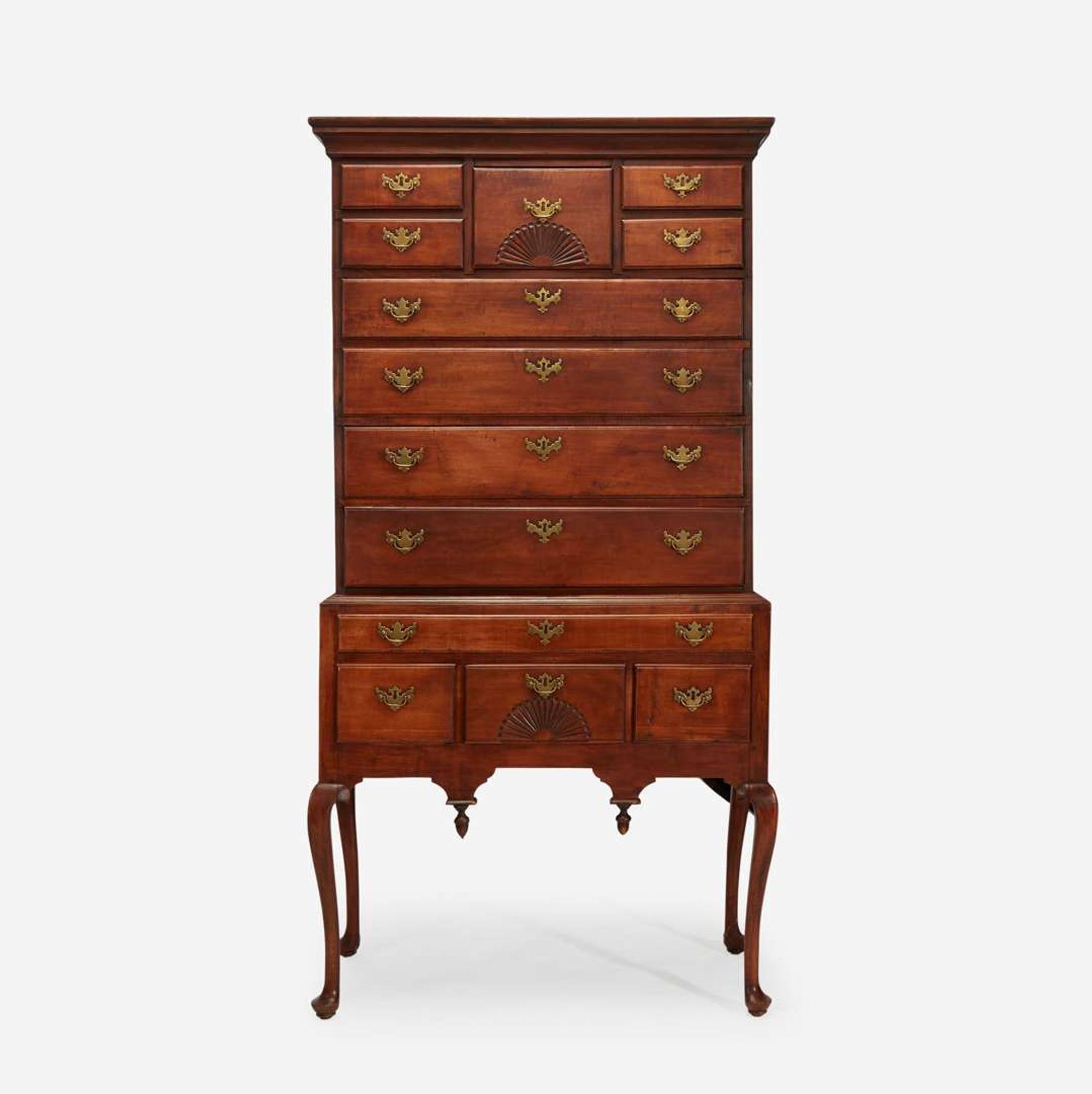 A Queen Anne carved cherry high chest New England, mid-18th century