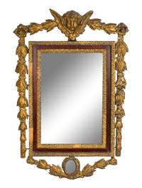 An Italian Baroque Style Giltwood Mirror