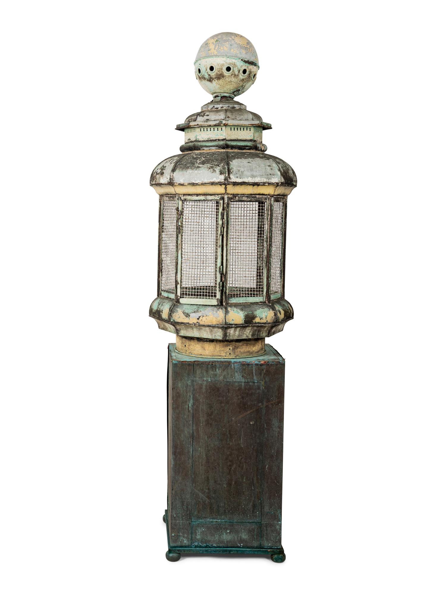 A Pair of Weathered Painted Sheet Metal Lanterns Converted to Bird Cages