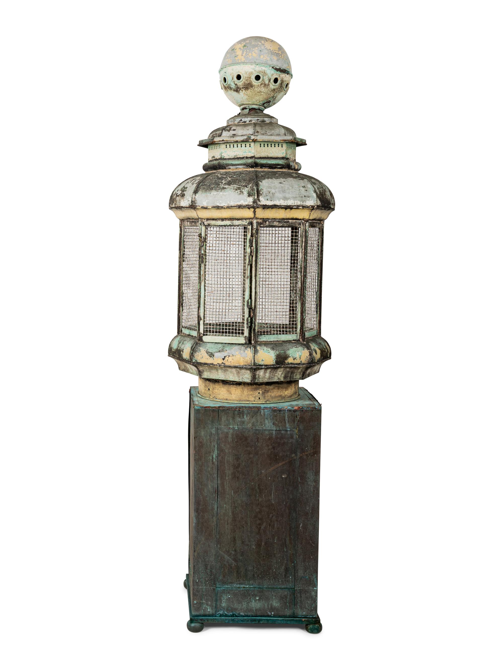 A Pair of Weathered Painted Sheet Metal Lanterns Converted to Bird Cages