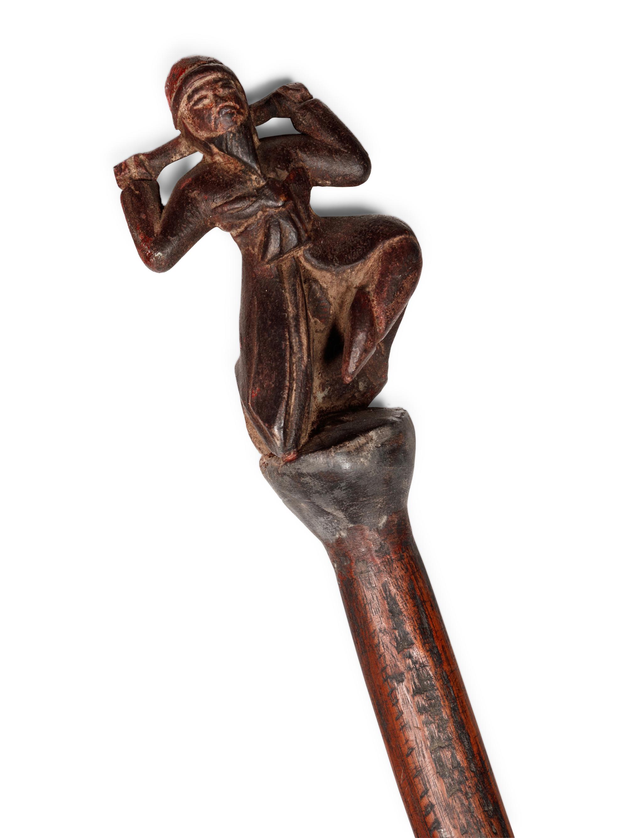 A South East Asian Carved Polychrome Figural Walking Stick