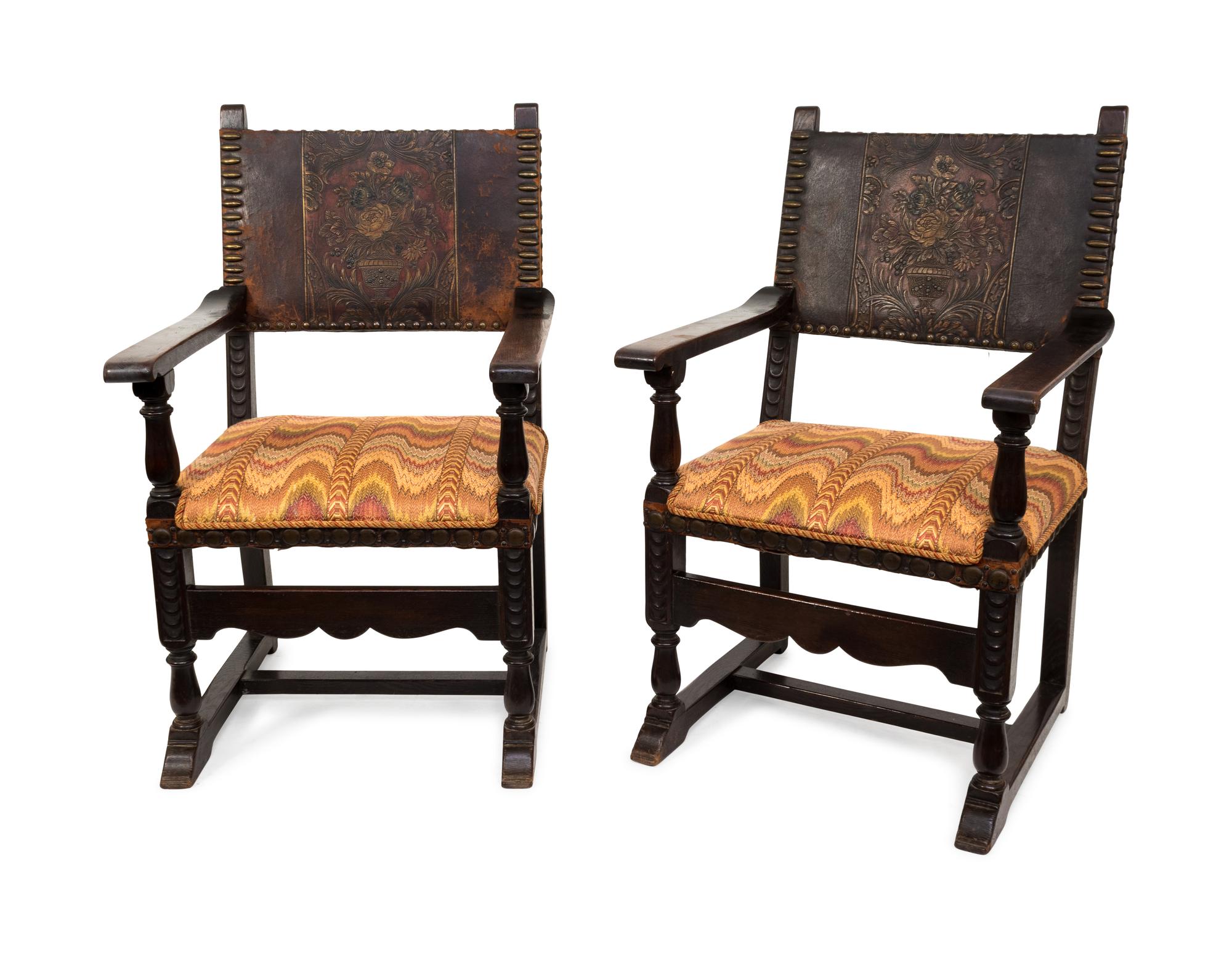 A Pair of Renaissance Revival Carved Oak Armchairs — EARLY 20TH CENTURY