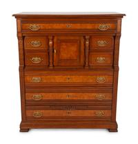 A Victorian Burl Inlaid Mahogany Chest of Drawers