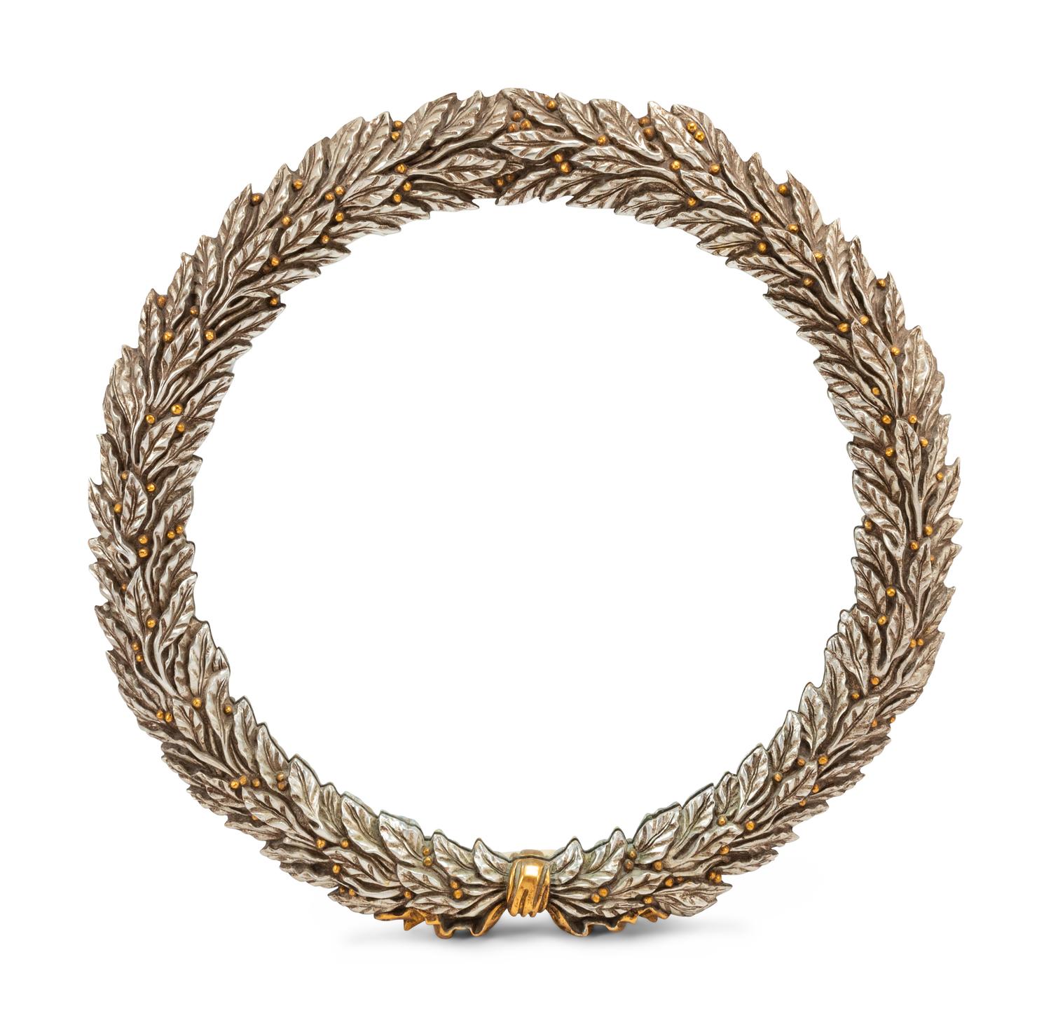 A Pair of Carved, Gilt and Silvered Wood Laurel Wreath Mirrors