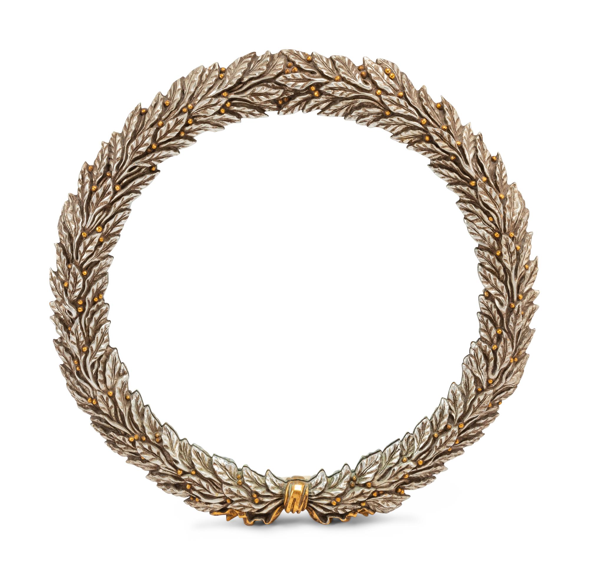 A Pair of Carved, Gilt and Silvered Wood Laurel Wreath Mirrors