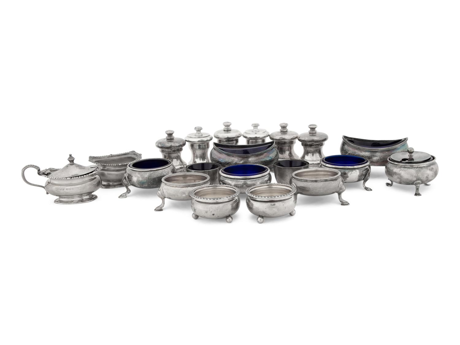 A Collection of Silver Pepper Mills and Salt Cellars