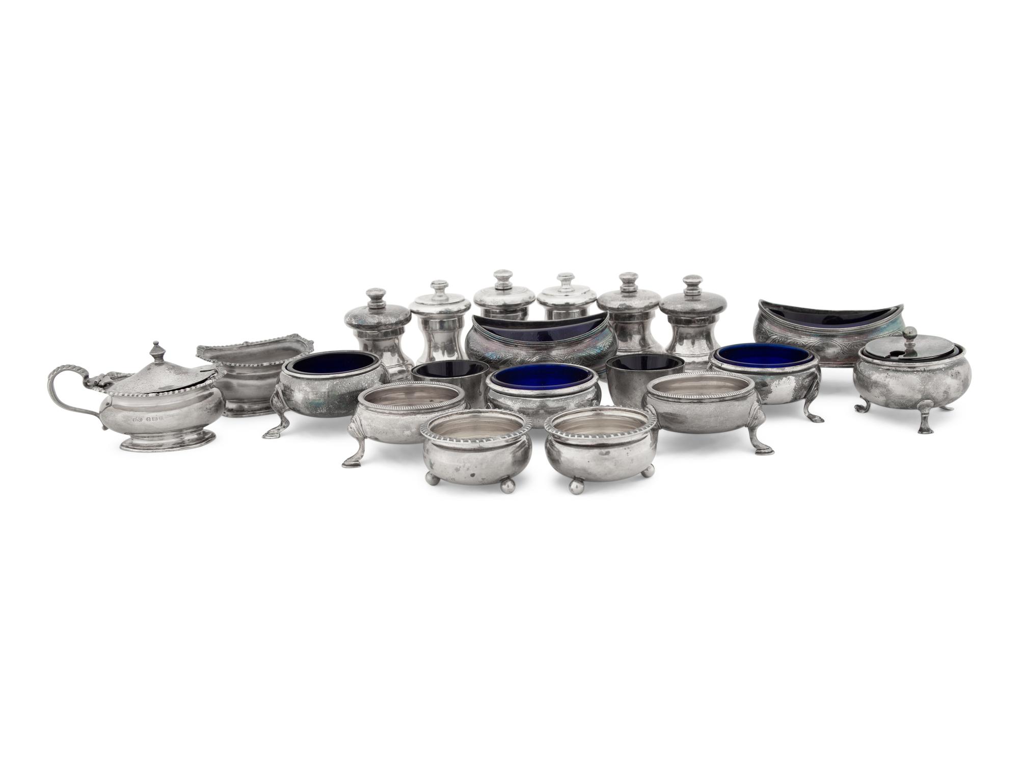 A Collection of Silver Pepper Mills and Salt Cellars
