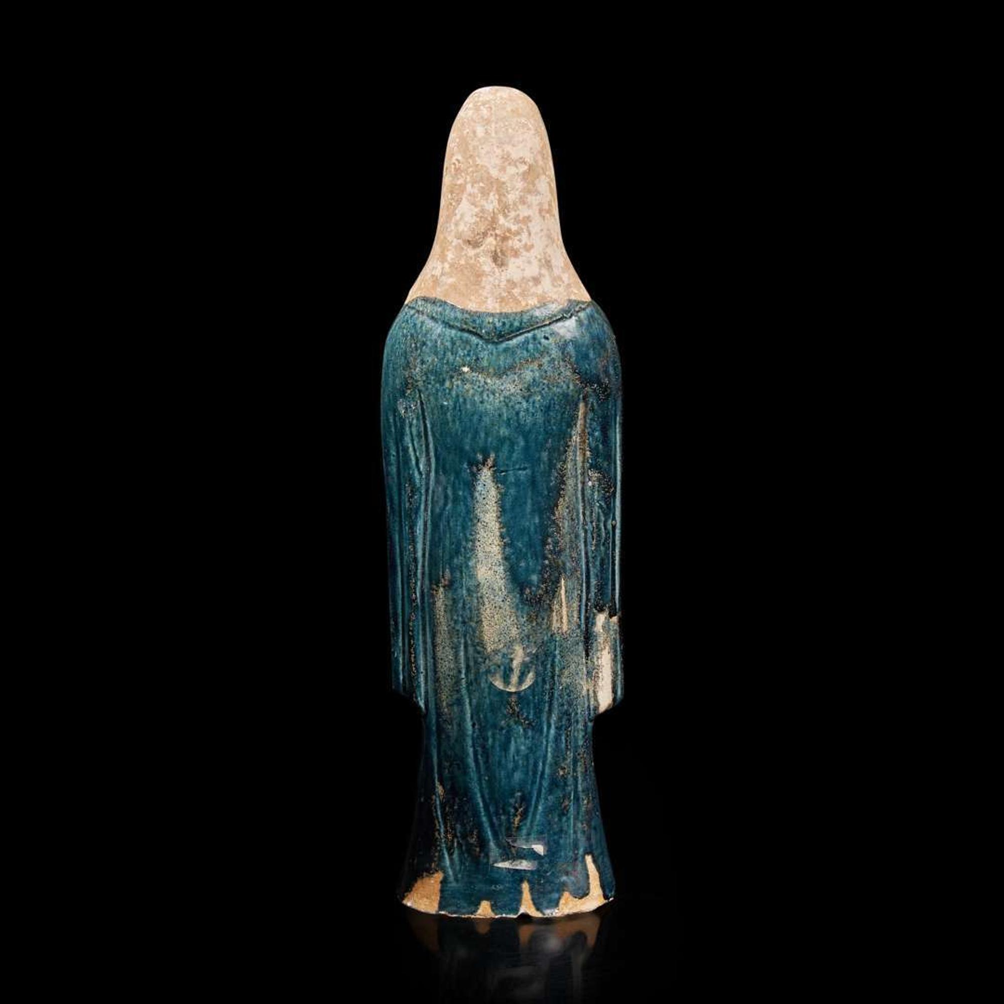 A Chinese sancai-glazed pottery attendant 三彩人物塑像 Possibly Tang dynasty ????