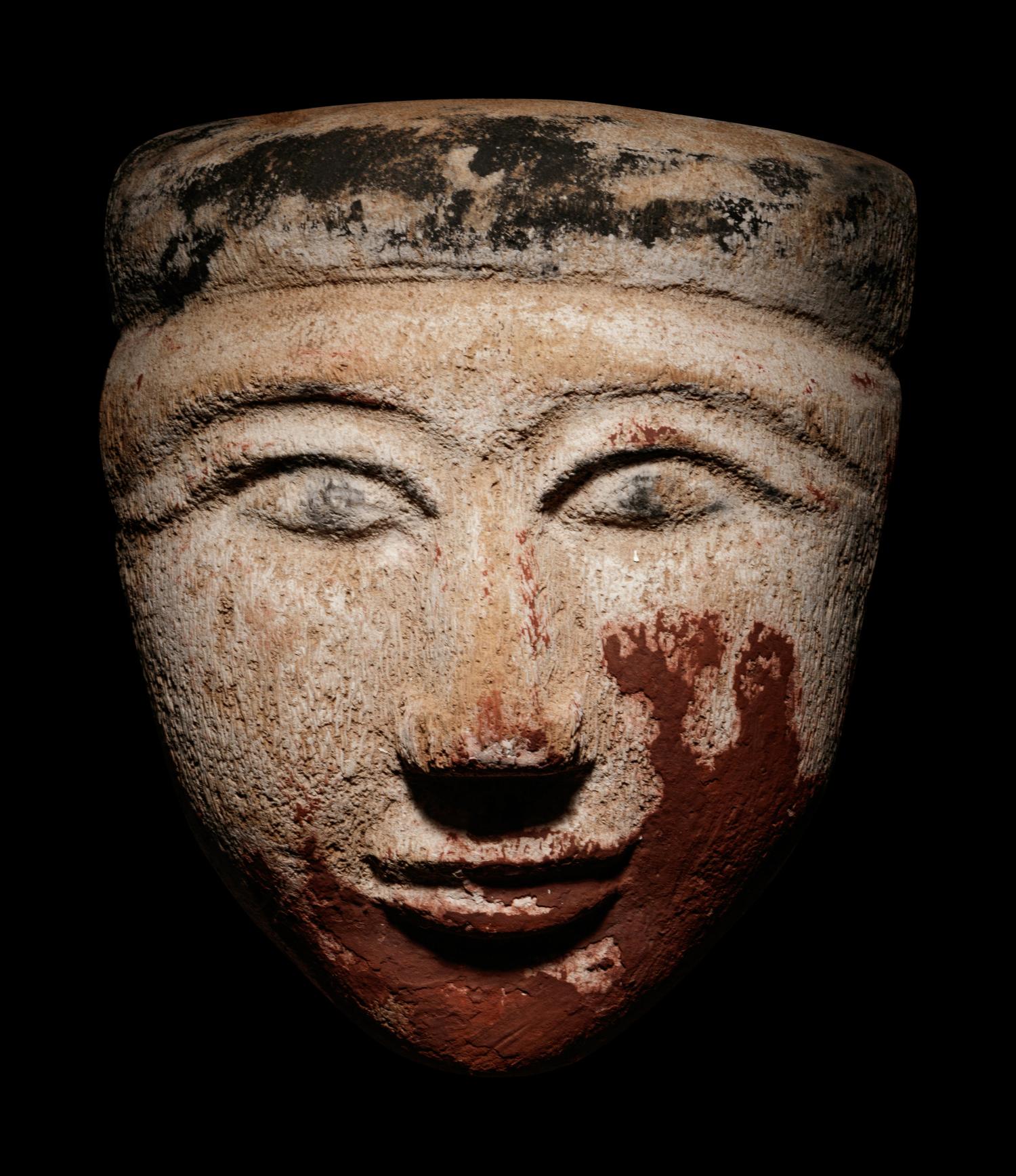 An Egyptian Wood Mummy Mask