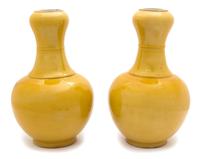 A Pair of Chinese Yellow Glazed Porcelain Vases Height 13 1/2 x diameter 7 1/2 inches. — LATE 19TH/EARLY 20TH CENTURY