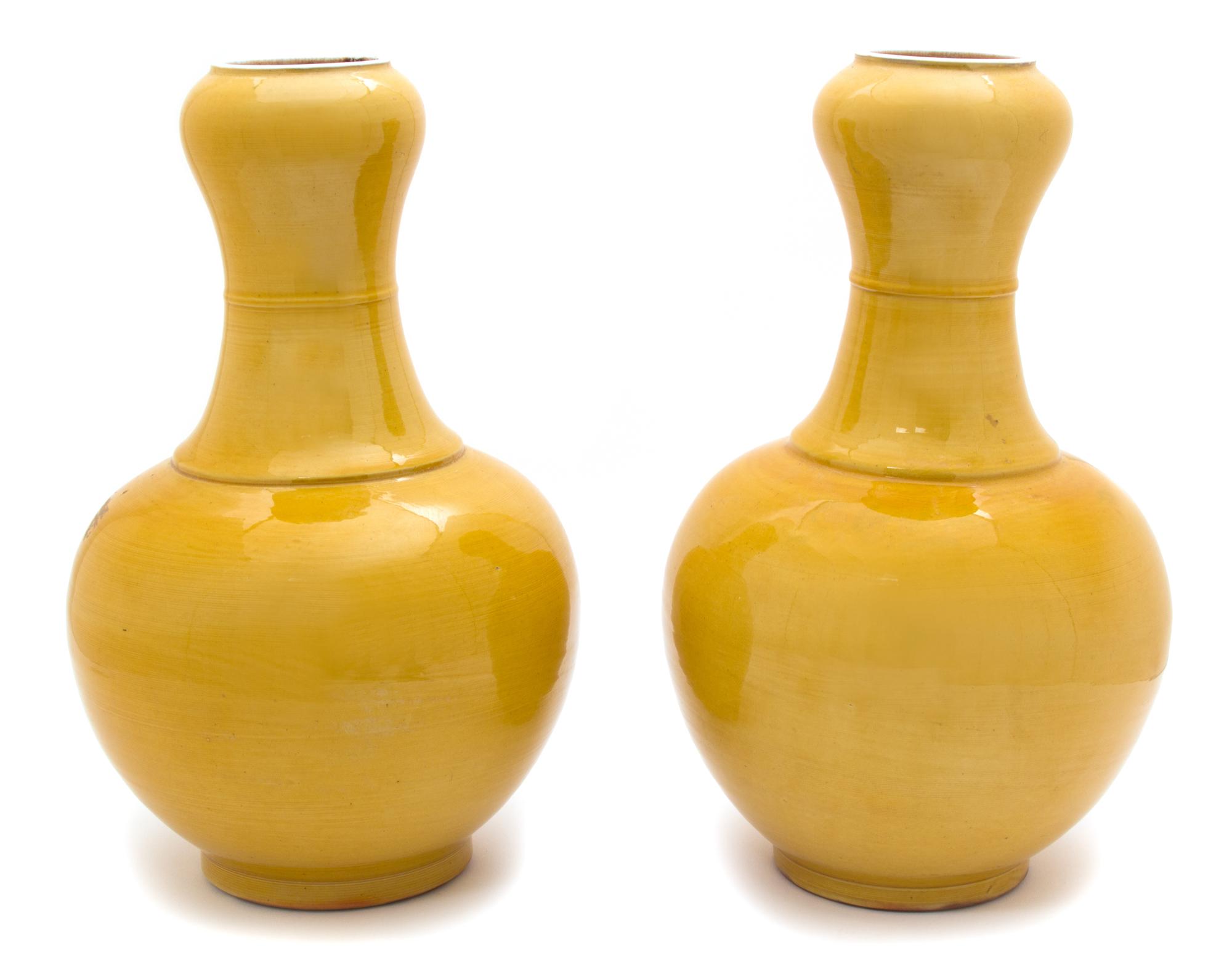 A Pair of Chinese Yellow Glazed Porcelain Vases Height 13 1/2 x diameter 7 1/2 inches. — LATE 19TH/EARLY 20TH CENTURY
