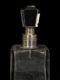 Four American Silver Mounted Cut Glass Decanters