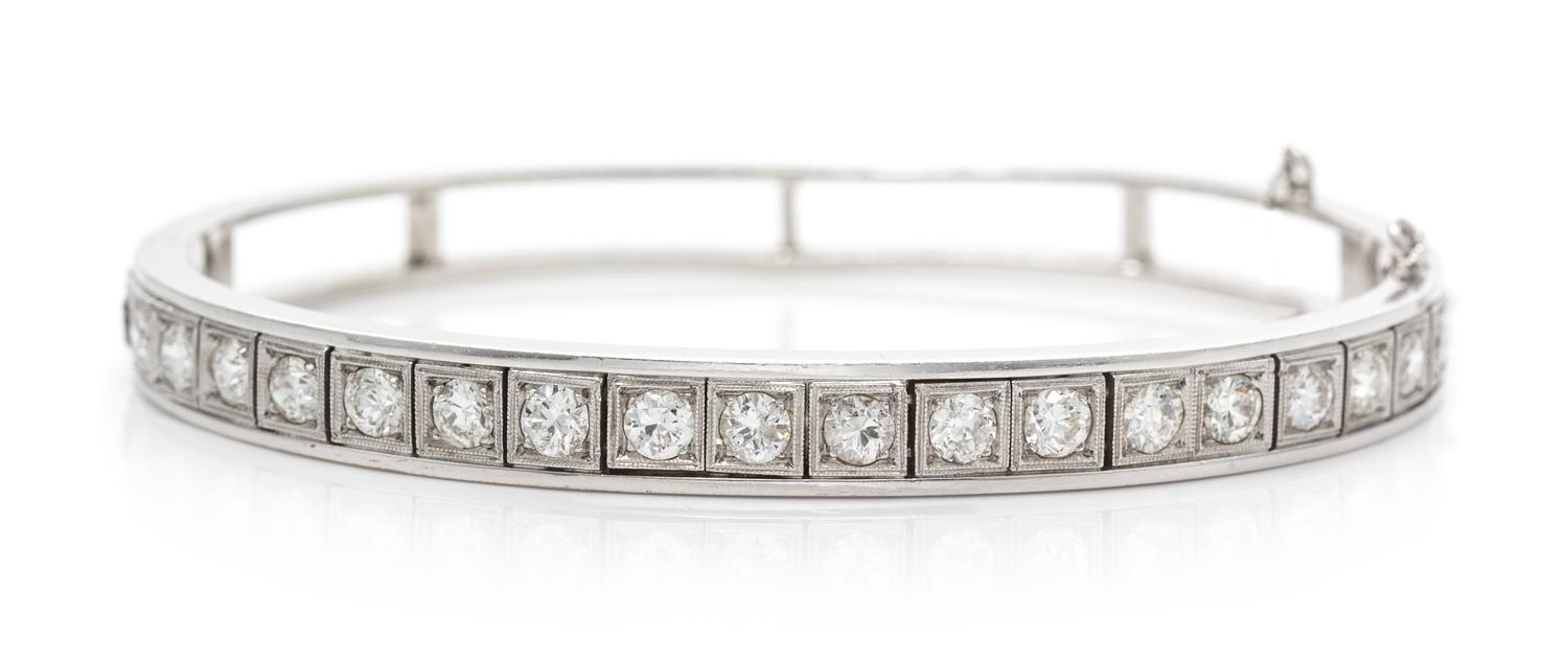 A 14 Karat White Gold and Diamond Bangle Bracelet, 12.50 dwts.
