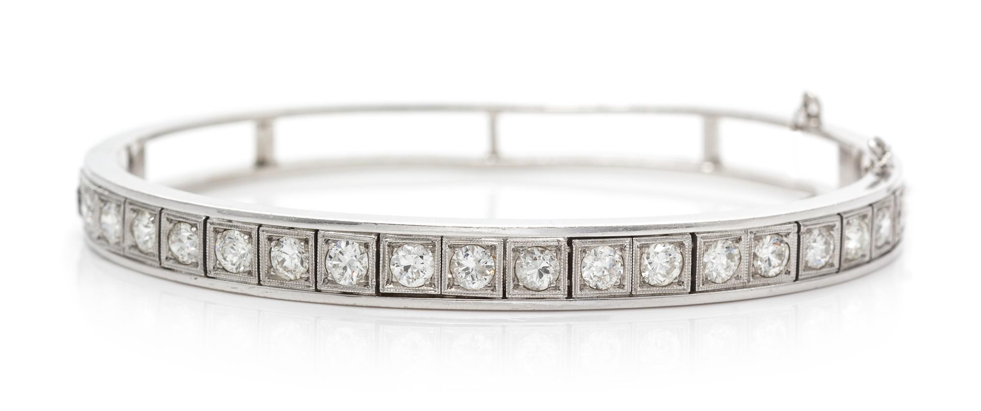 A 14 Karat White Gold and Diamond Bangle Bracelet, 12.50 dwts.