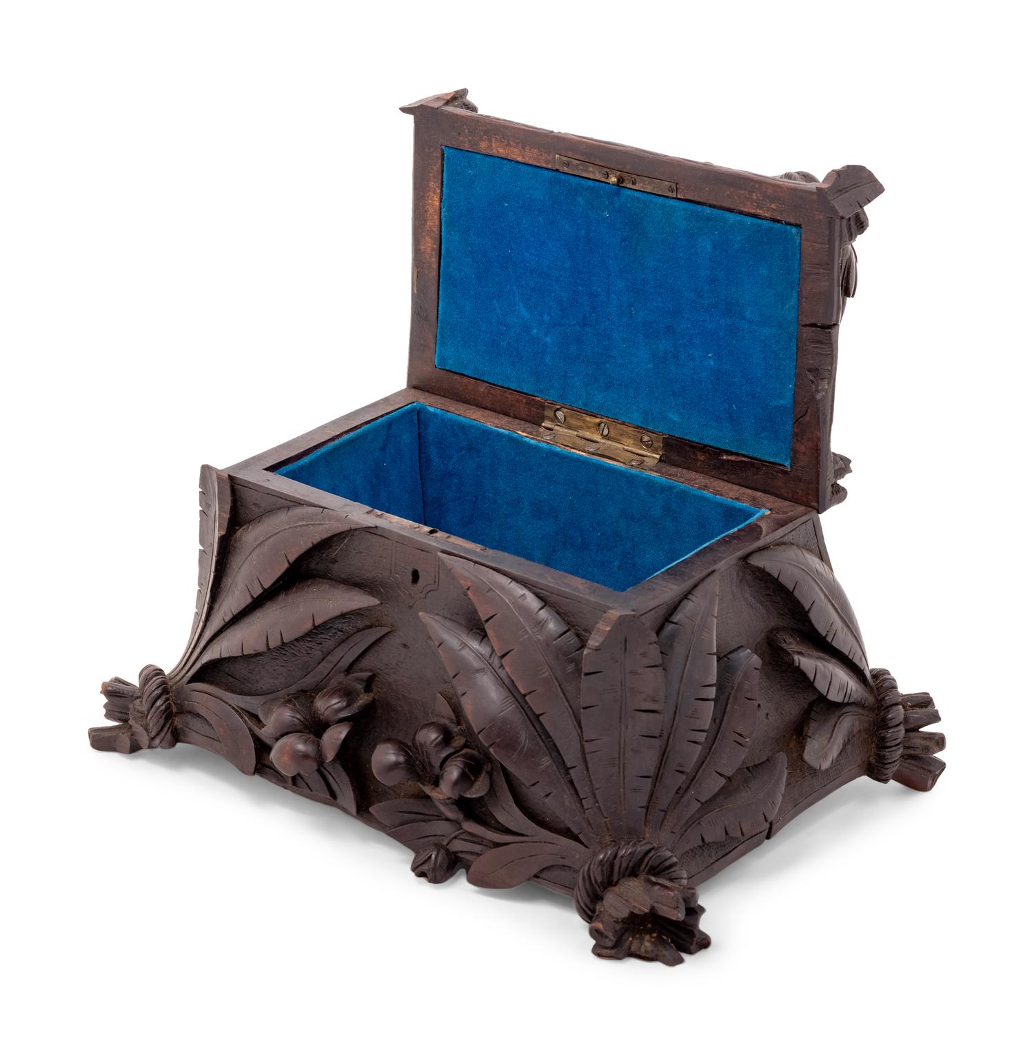 A Black Forest Carved Table Casket