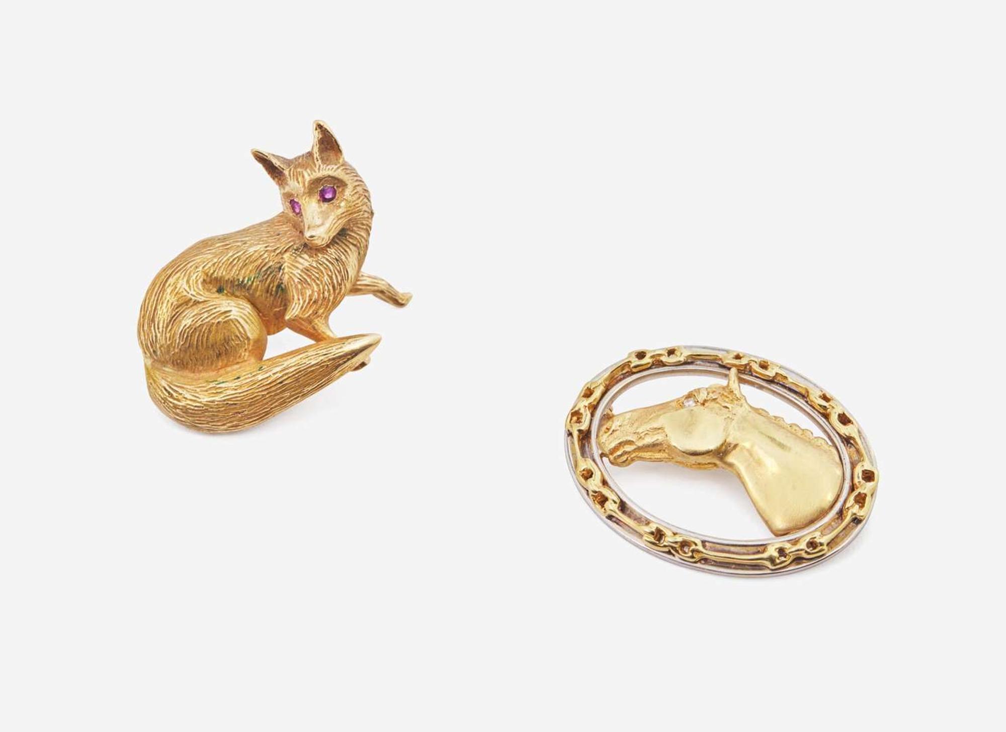 A Pair of 14K Yellow Gold Animal Brooches