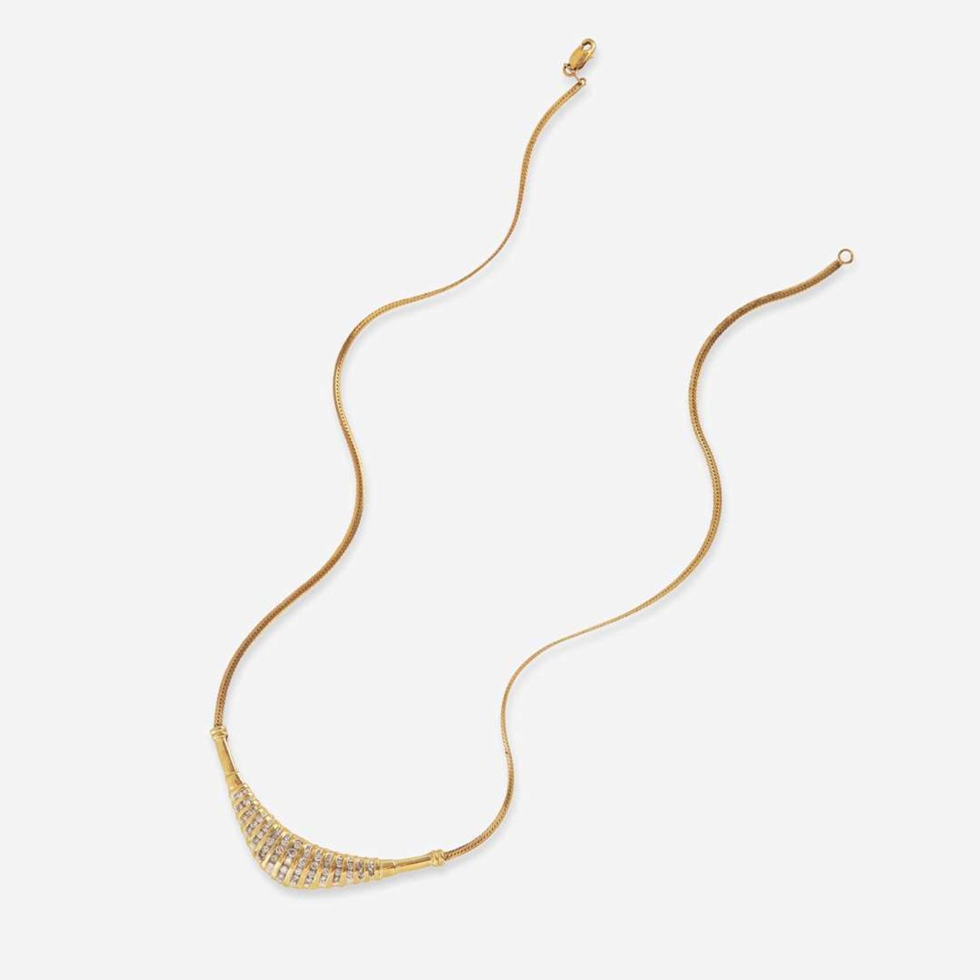 A 10K Yellow Gold and Diamond Necklace