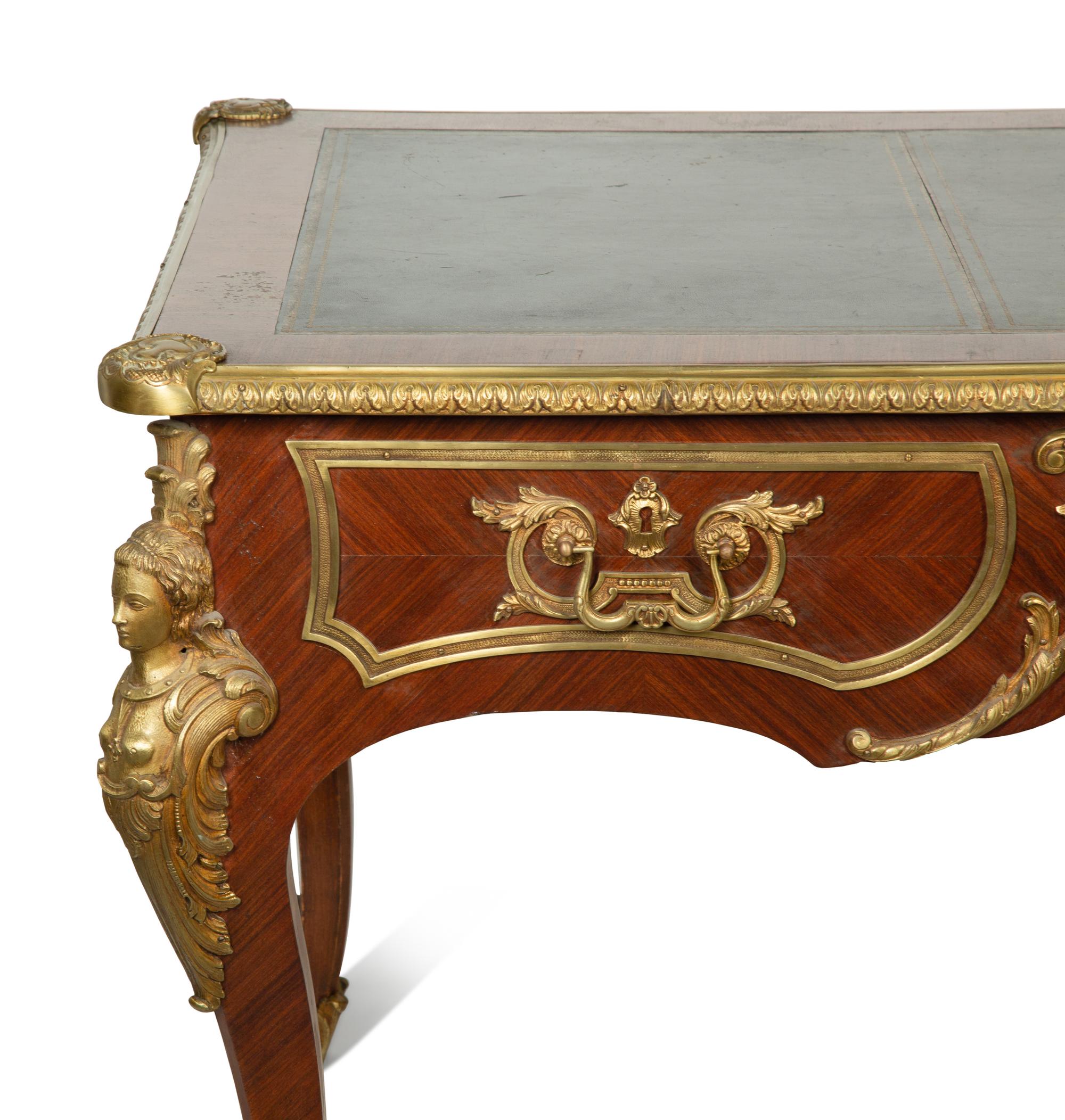 A Louis XV Style Gilt Bronze Mounted Kingwood Bureau Plat